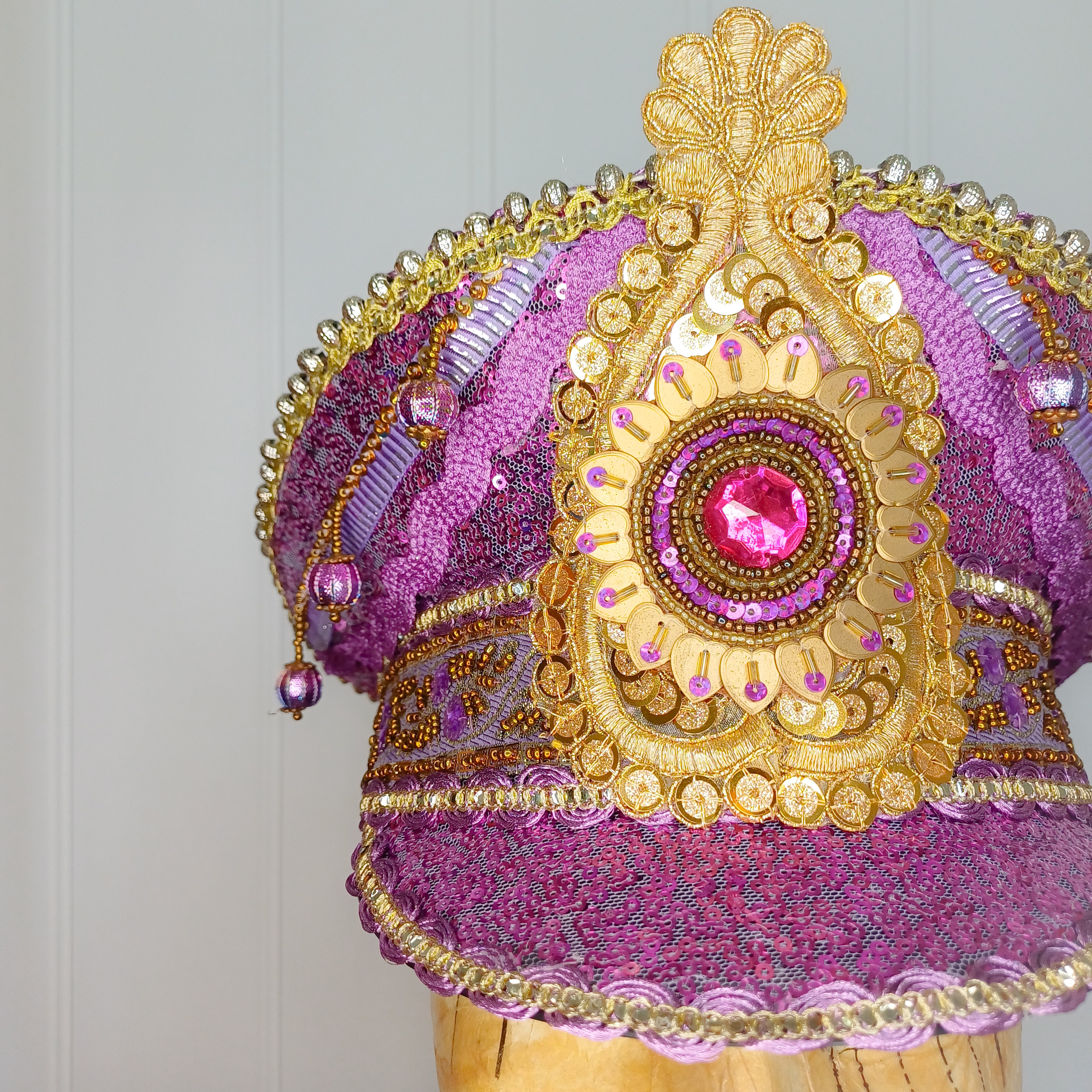 Purple sequinned captain's hat