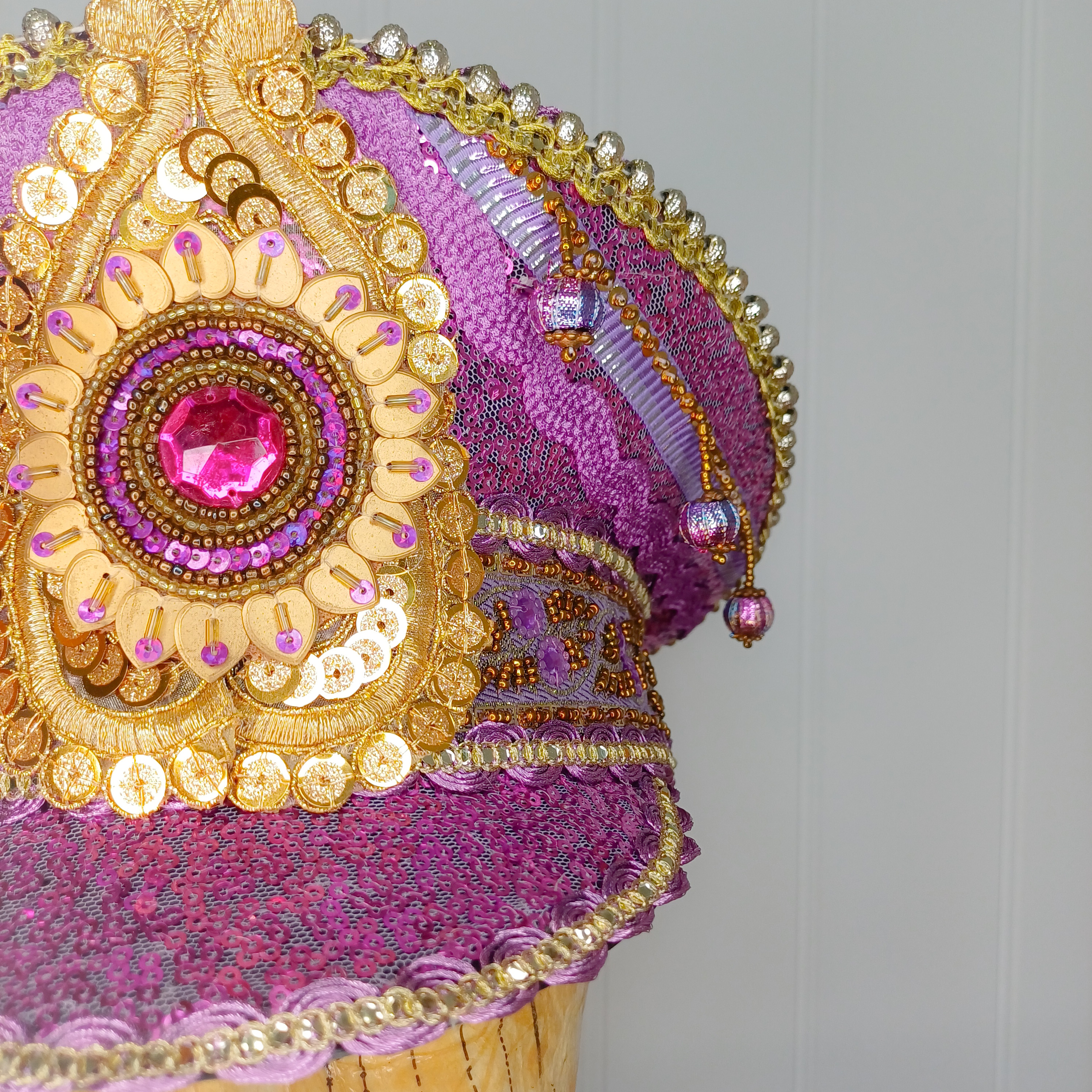 Purple sequinned captain's hat
