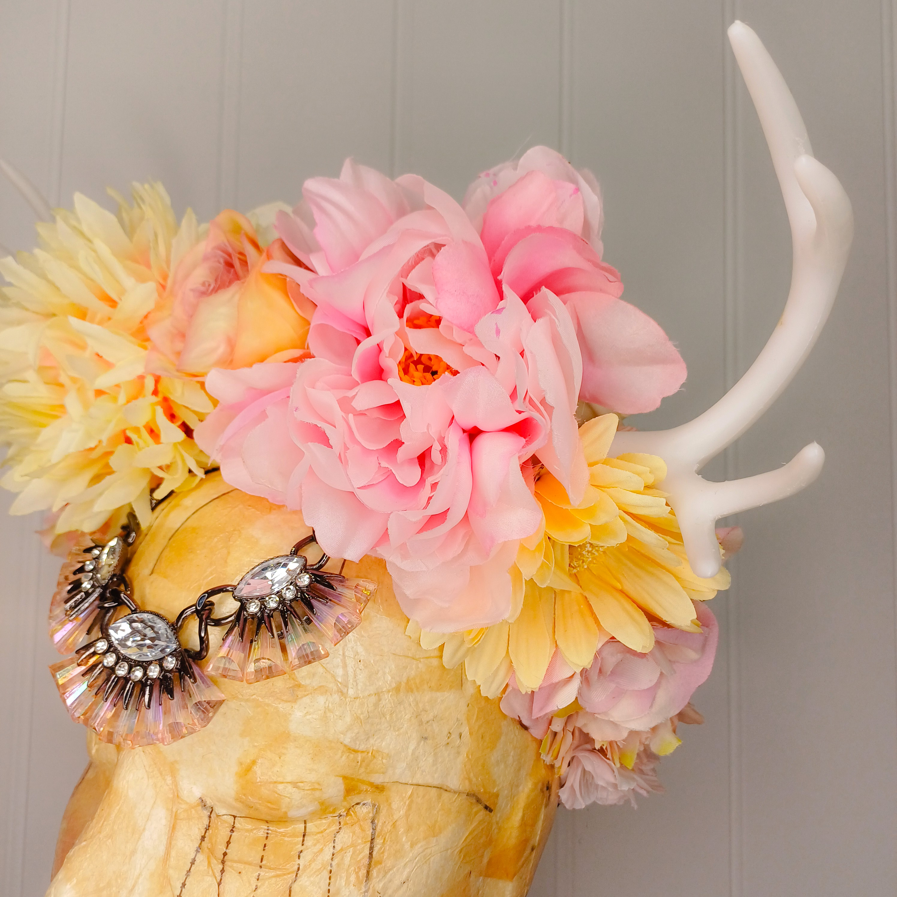Floral headdress with white horns 