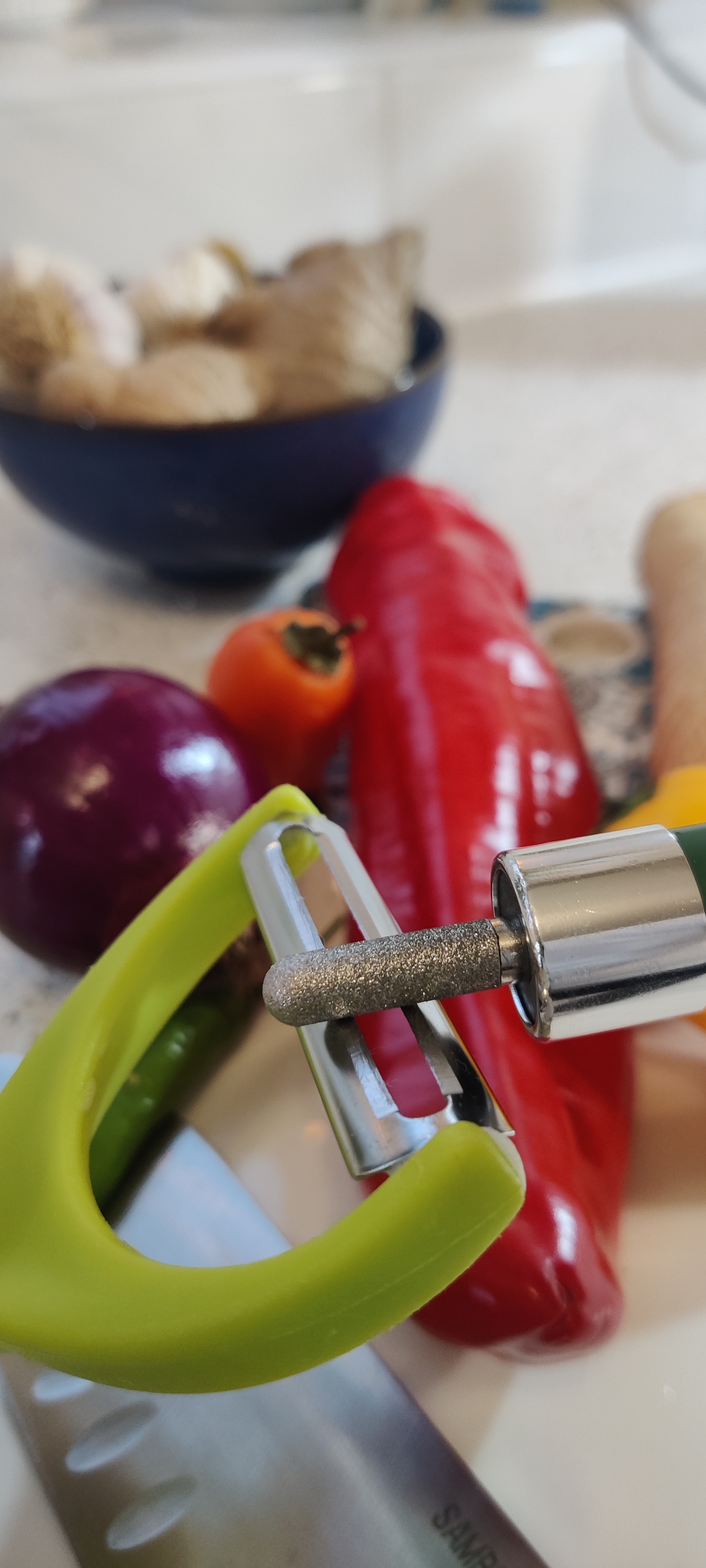 Ergonomic Sharpener for peelers and ALL blades in the home and shop