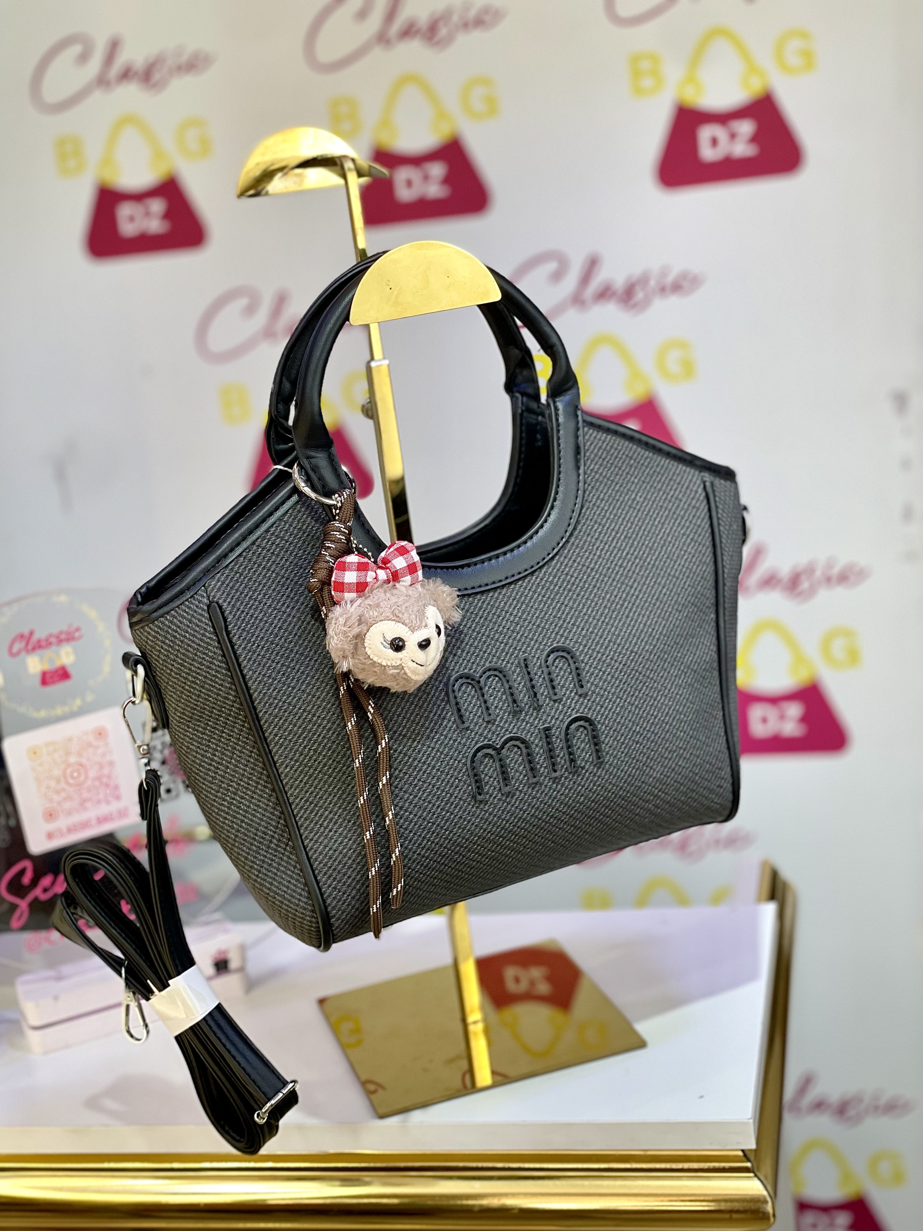 Sac miu miu avec pompon