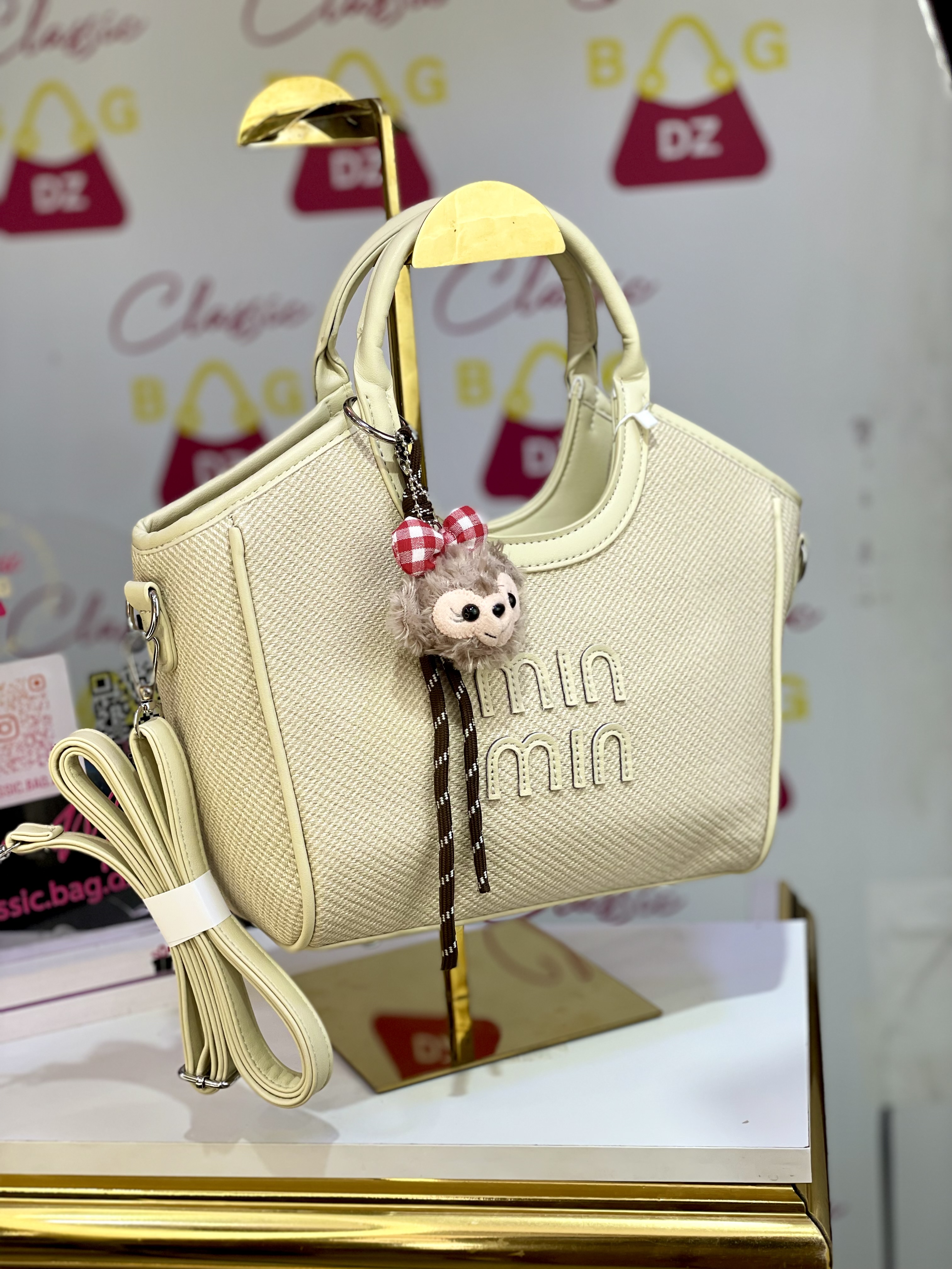 Sac miu miu avec pompon