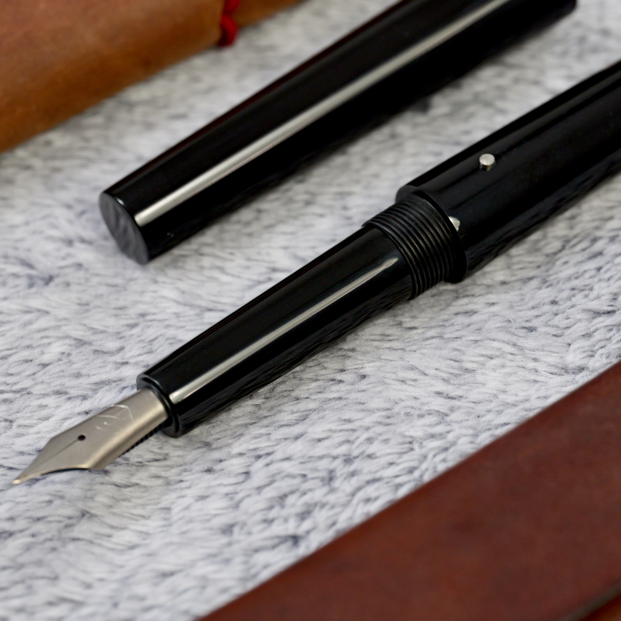 Stożek - ebonit - tytanowa stalówka i roll stop 