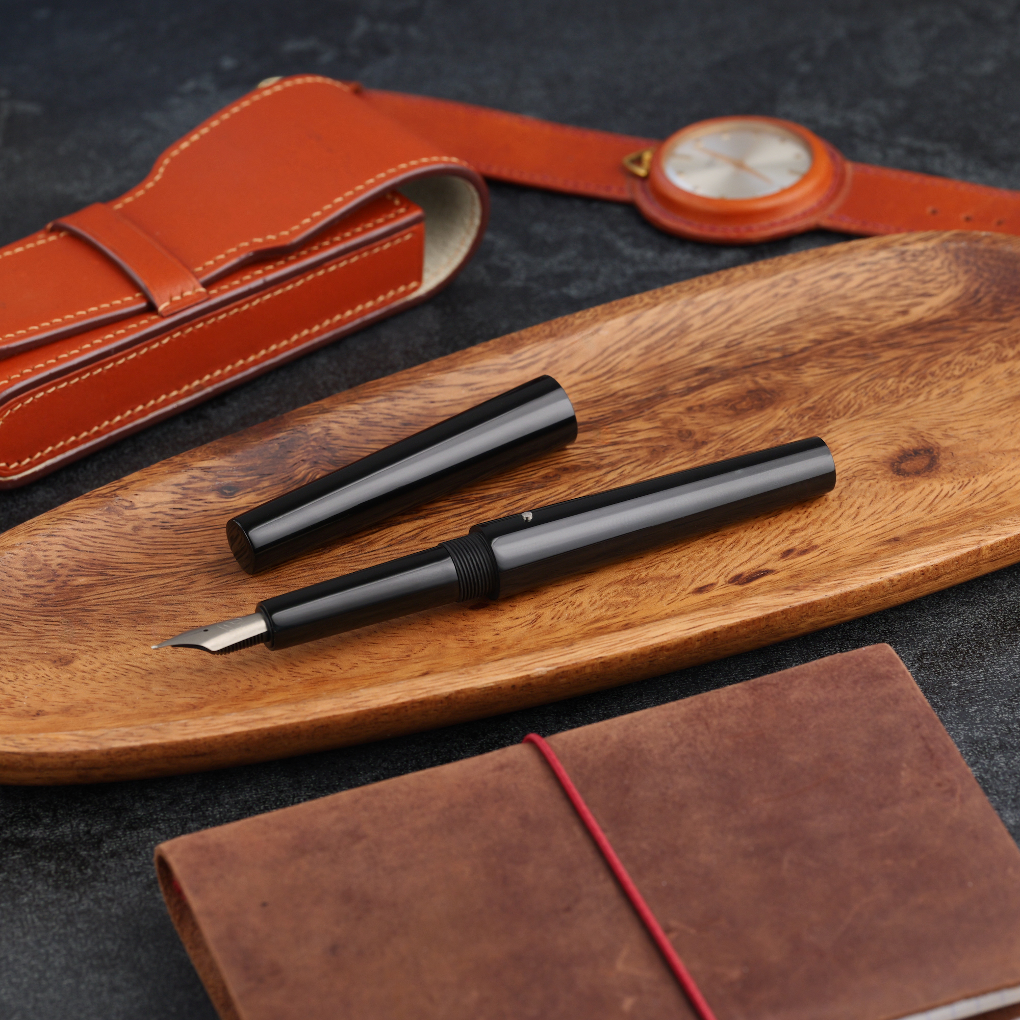 Stożek - ebonit - tytanowa stalówka i roll stop 