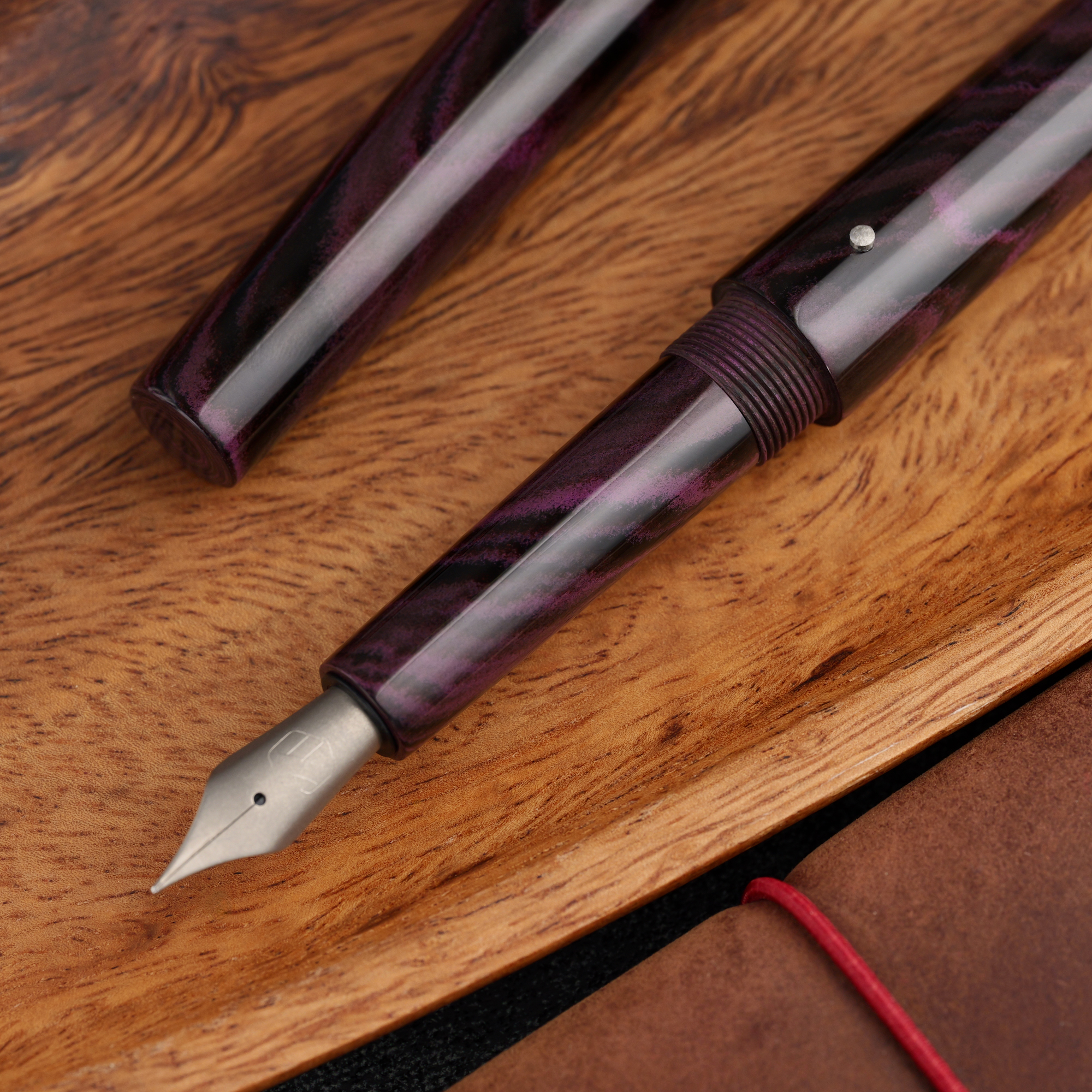 Stożek - ebonit - tytanowa stalówka i roll stop 