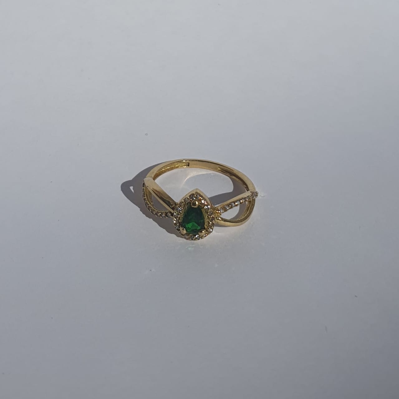 Gold ring with green stone