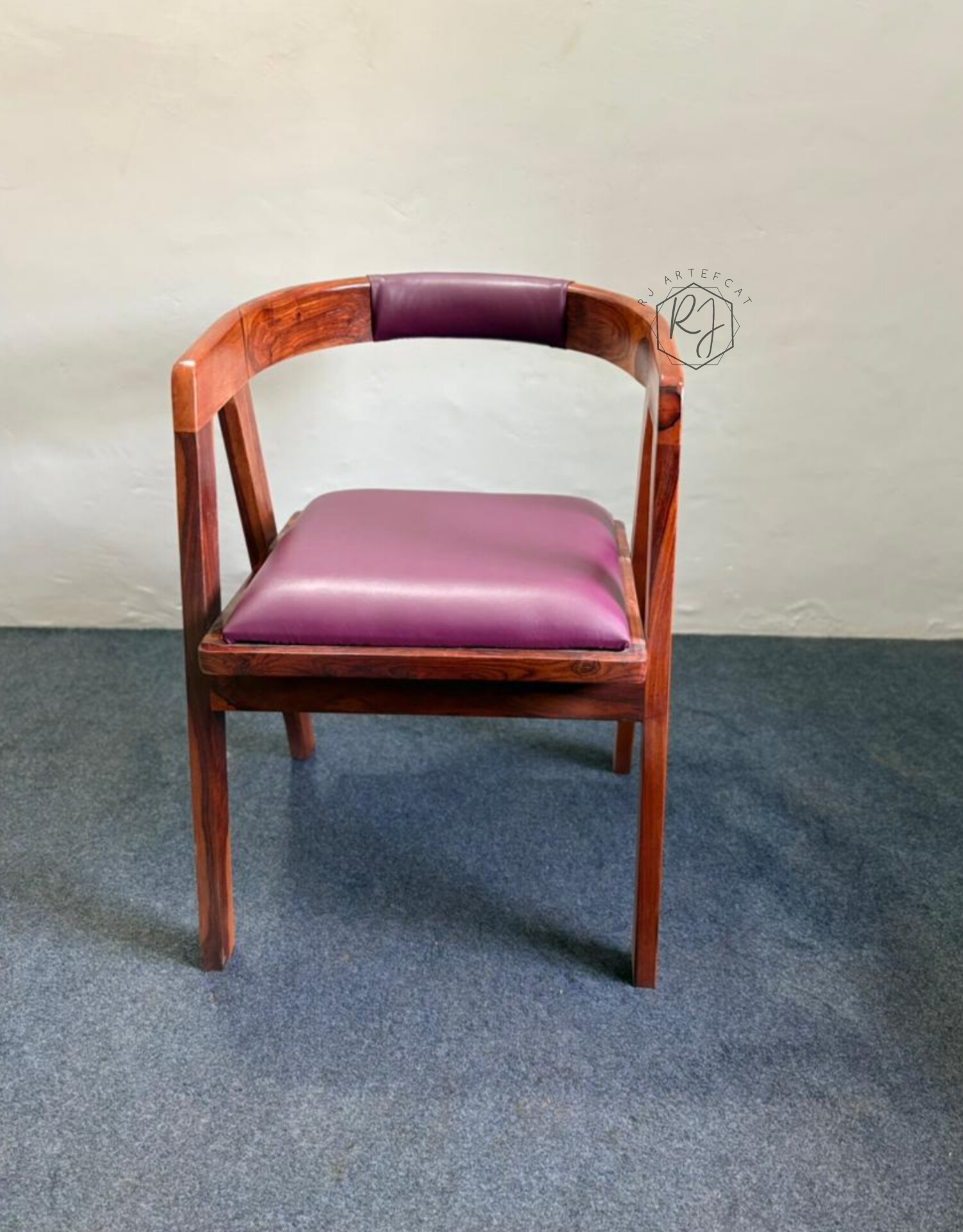 Wooden chair with purple cushion