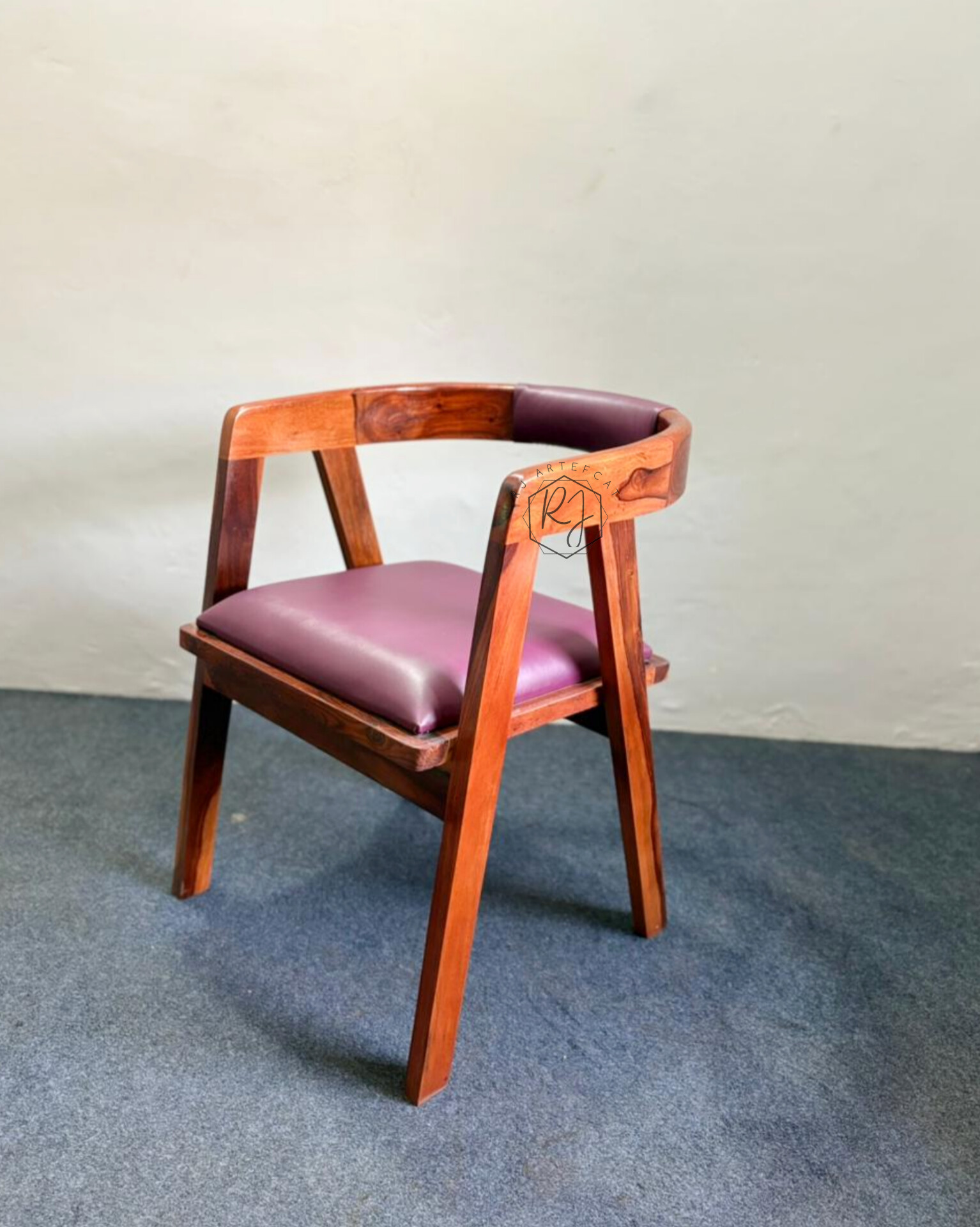 Wooden chair with purple cushion