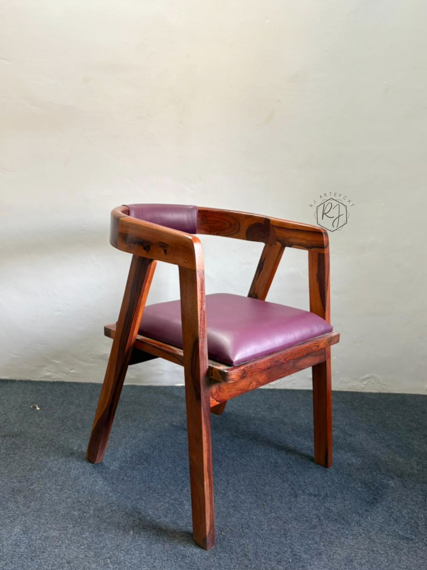 Wooden chair with purple cushion