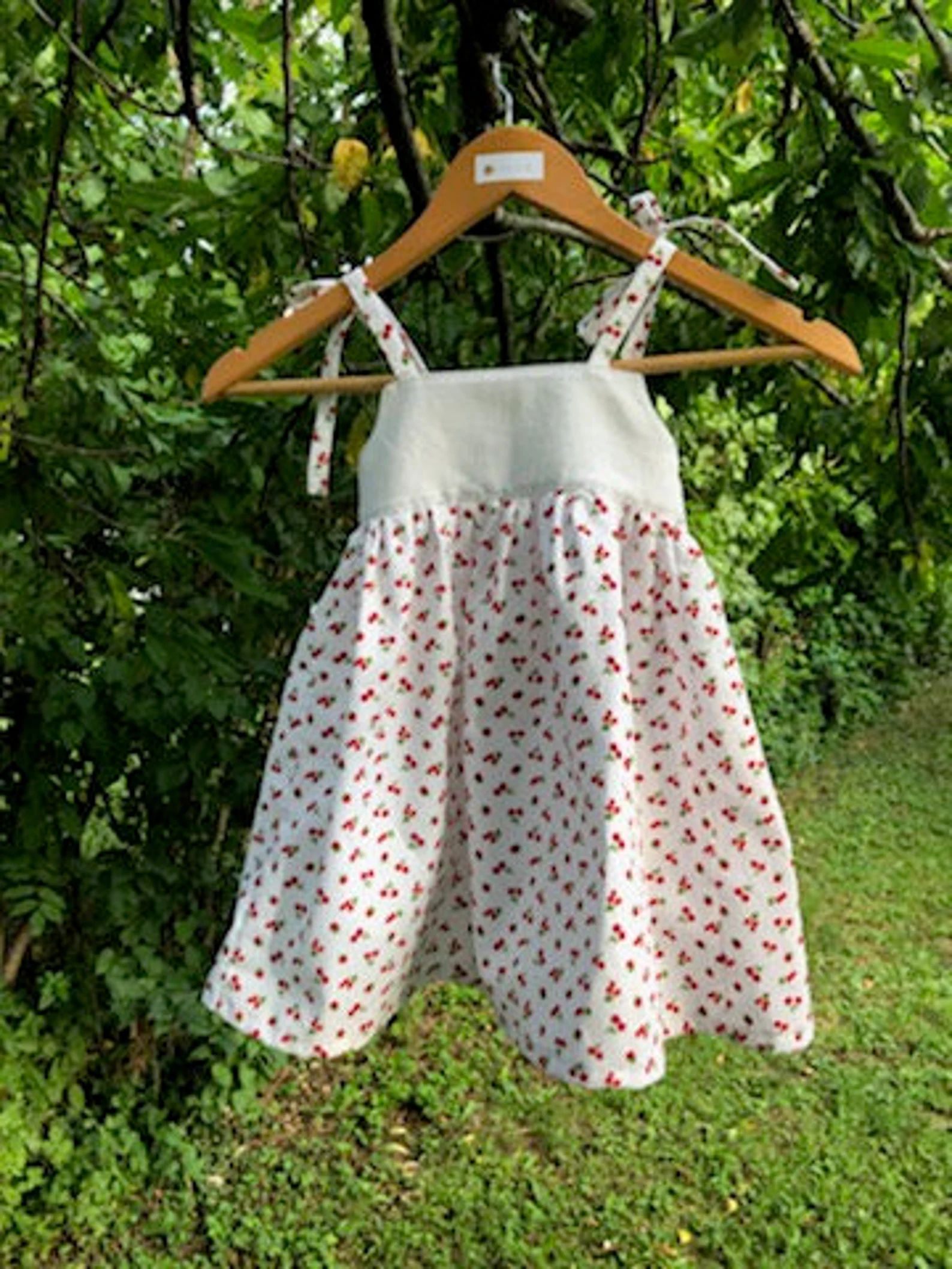 Robe bébé, enfant, en piqué de coton imprimé cerises