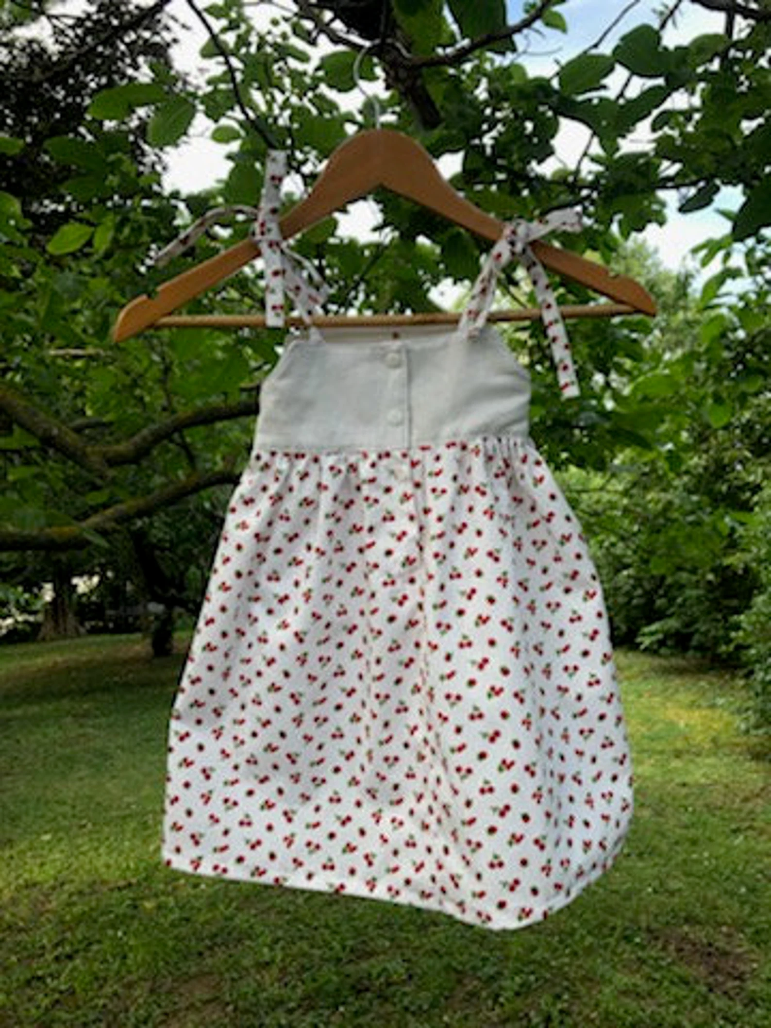 Robe bébé, enfant, en piqué de coton imprimé cerises