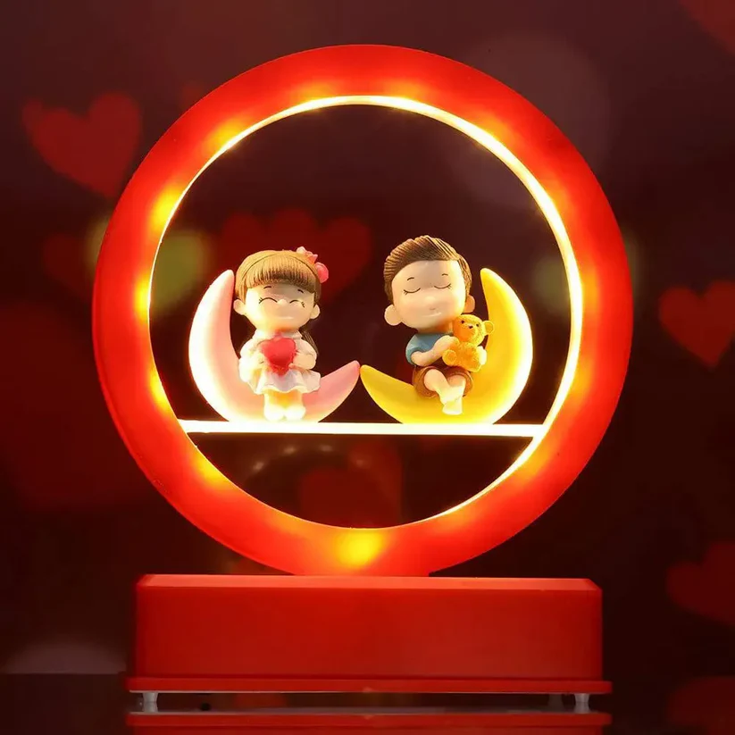 couple showpiece with beautiful heart lighting