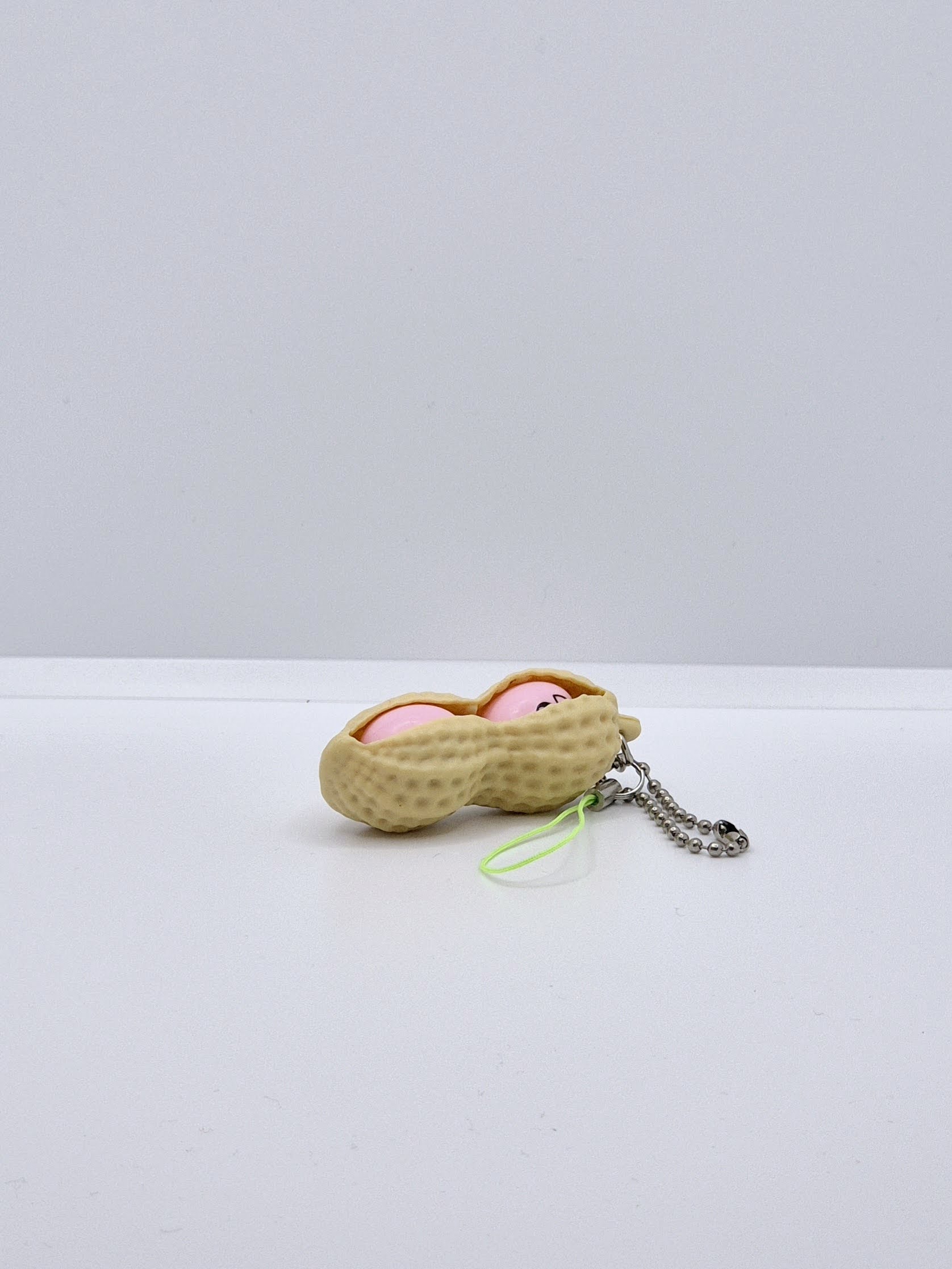 Išspaudžiamas riešutėlis