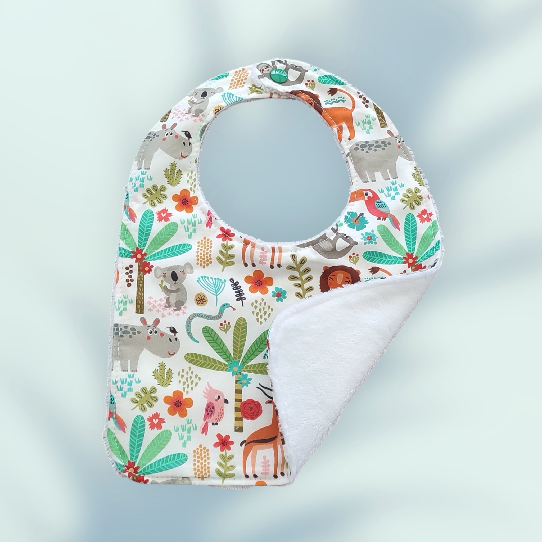 Ensemble naissance : un bavoir, un bandana, un protège épaule