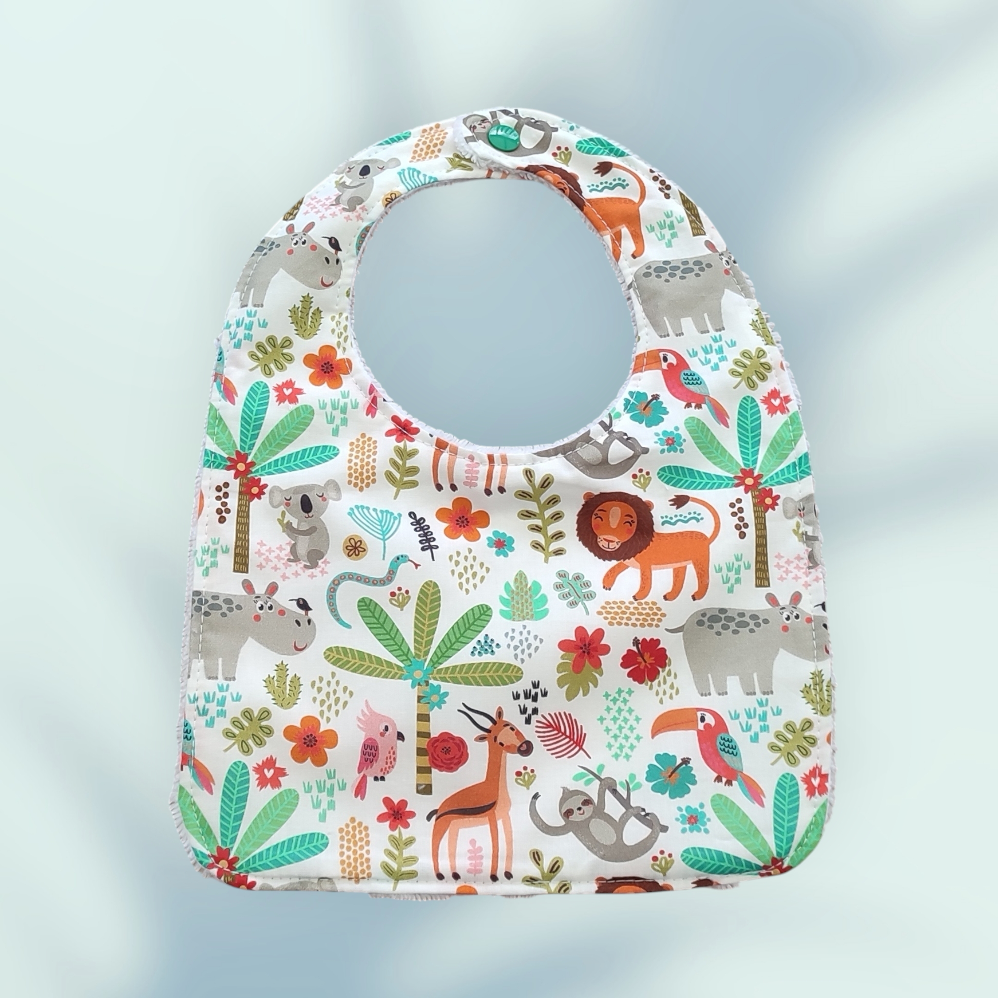 Ensemble naissance : un bavoir, un bandana, un protège épaule