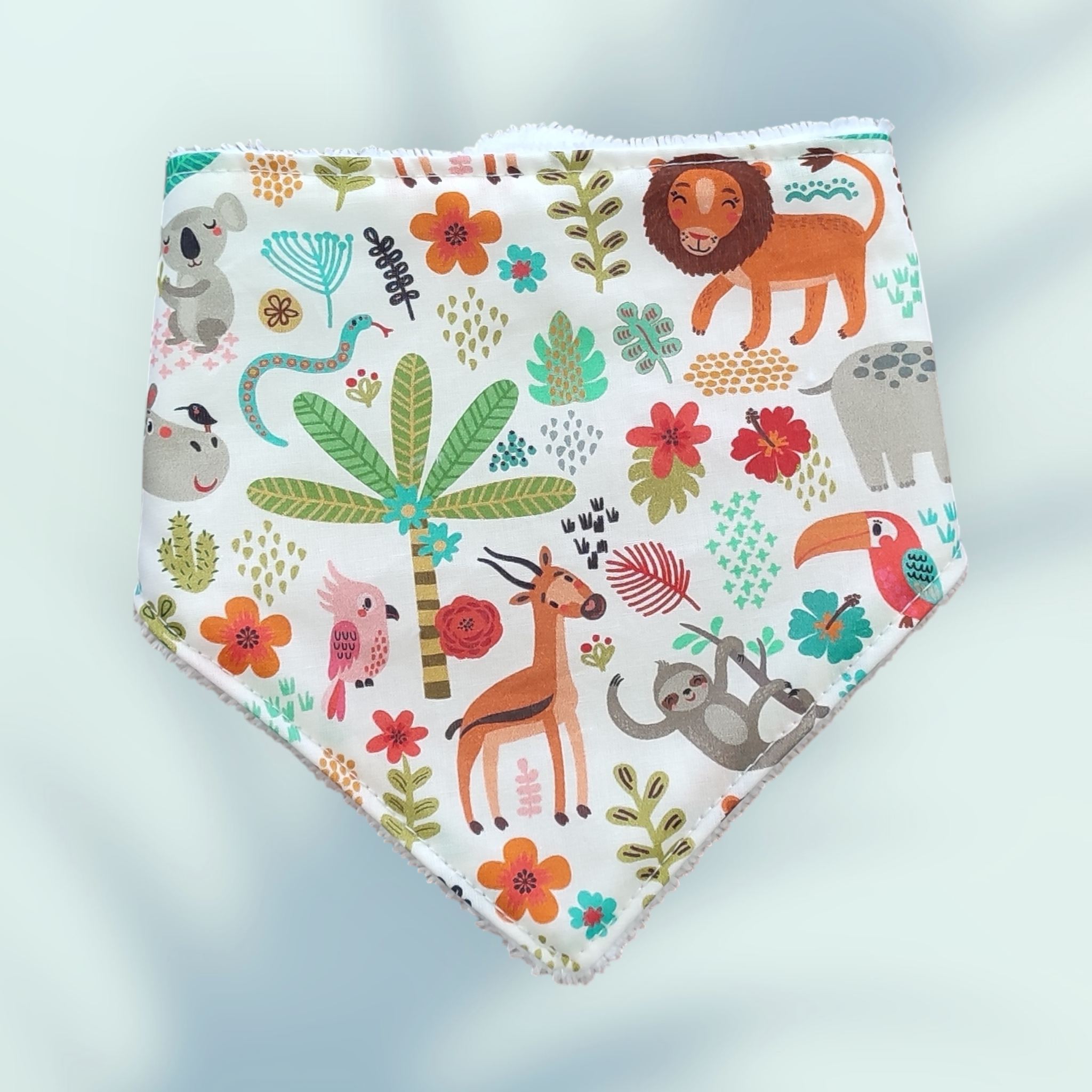 Ensemble naissance : un bavoir, un bandana, un protège épaule
