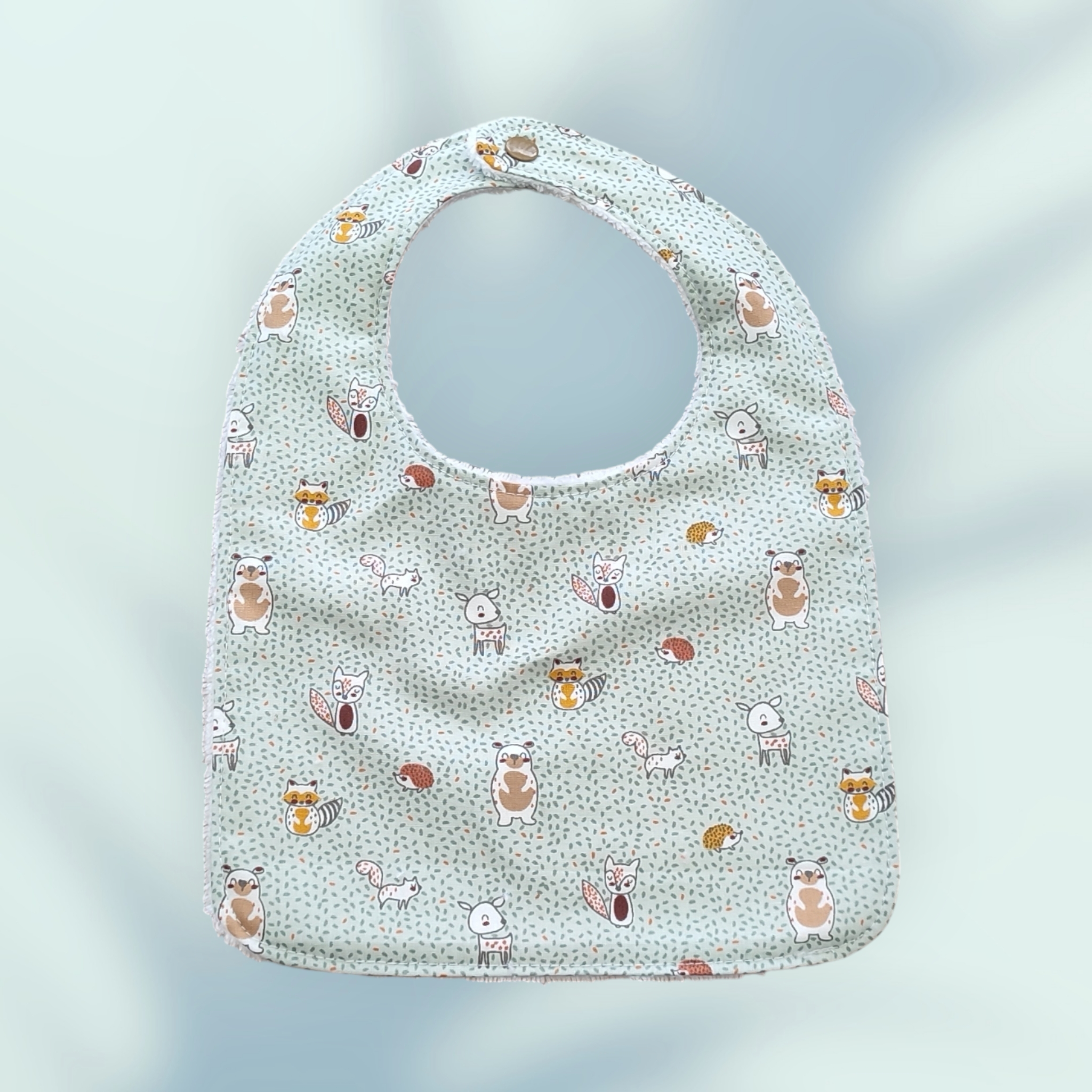Ensemble naissance comprenant un bavoir, un bandana et un protège épaule