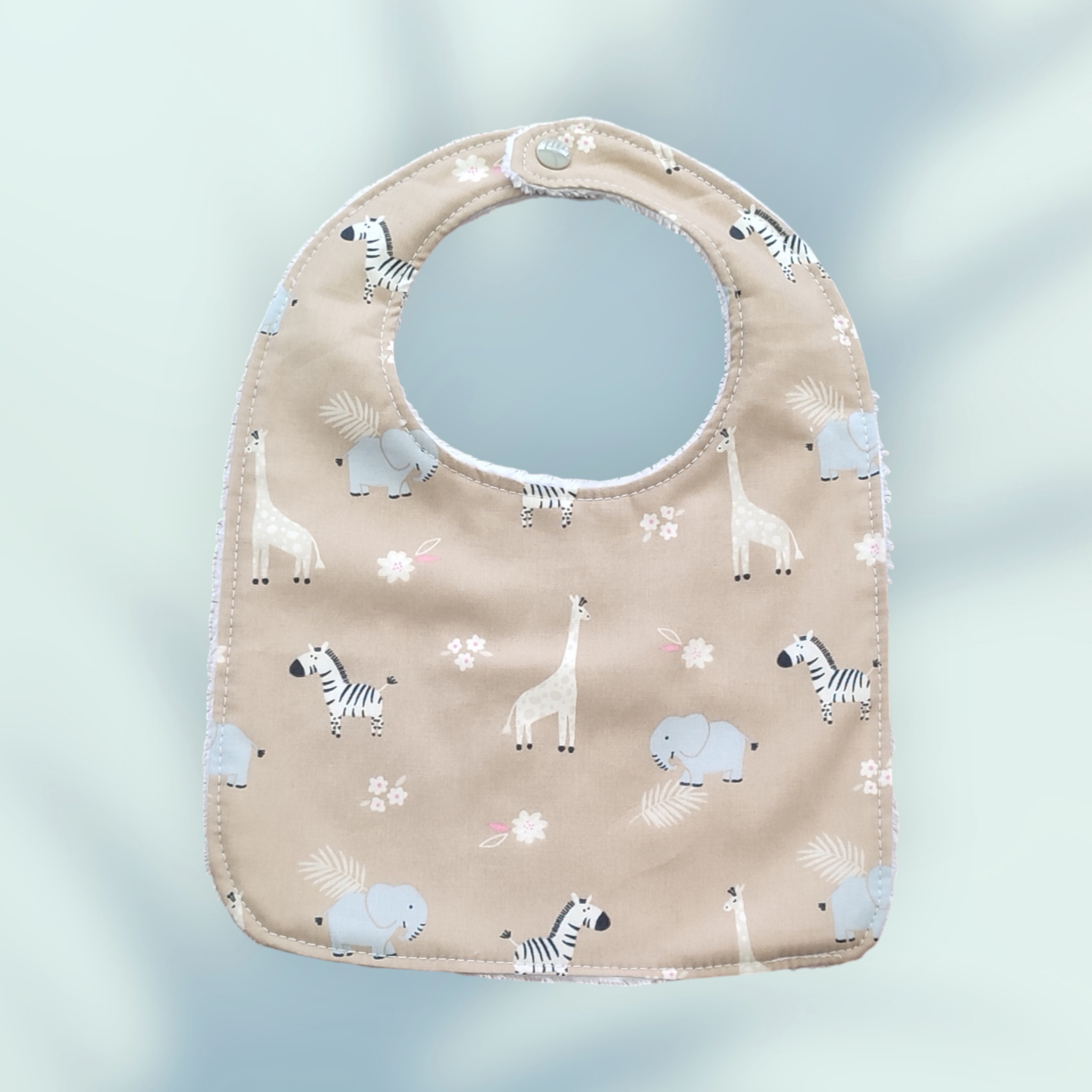 Ensemble naissance comprenant un bavoir, un bandana et un protège épaule