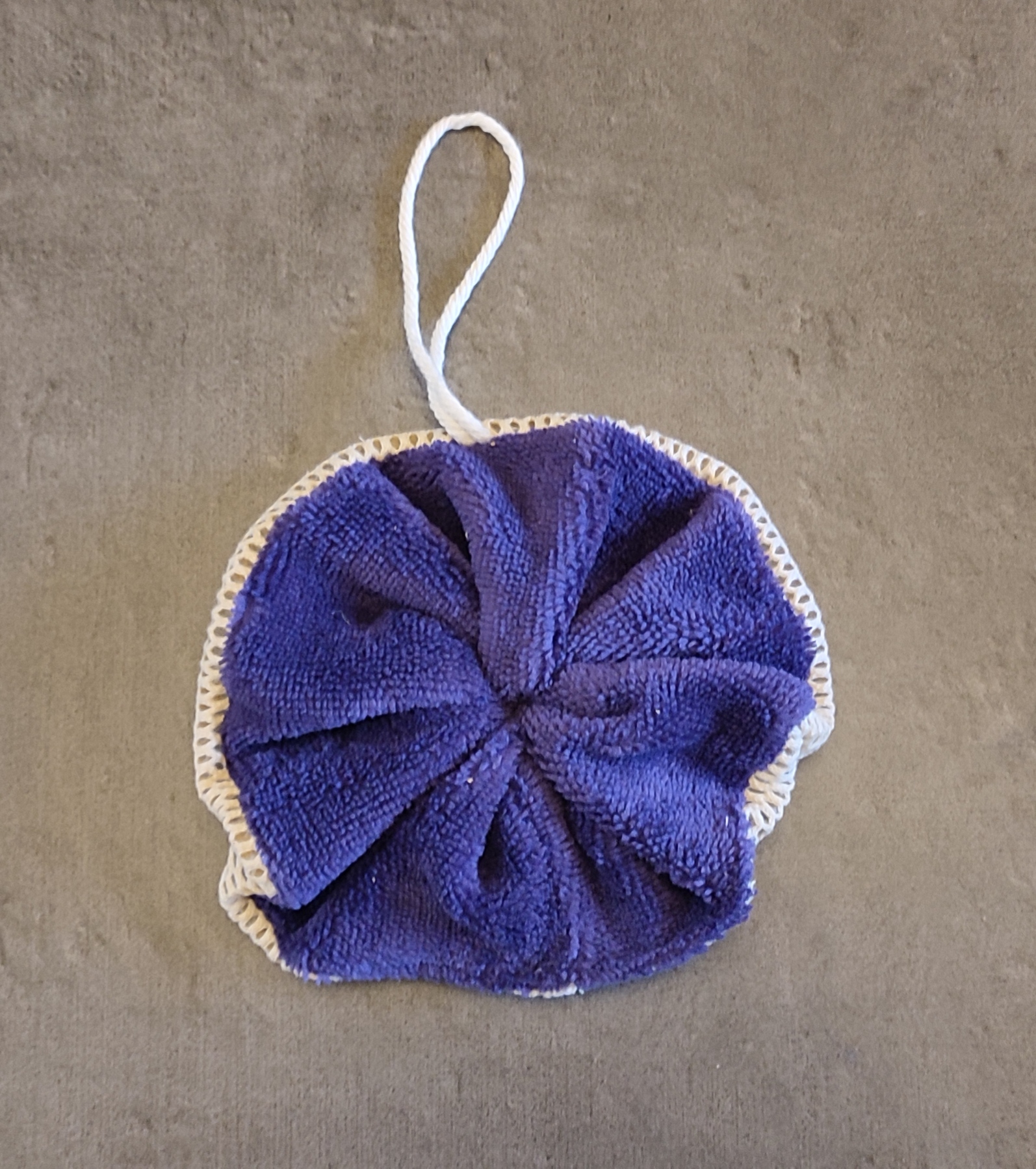 Fleur de douche exfoliante
