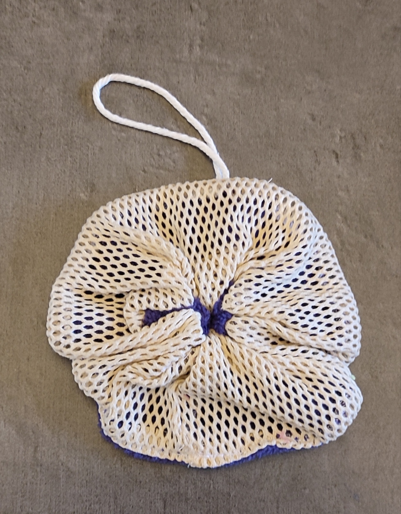 Fleur de douche exfoliante