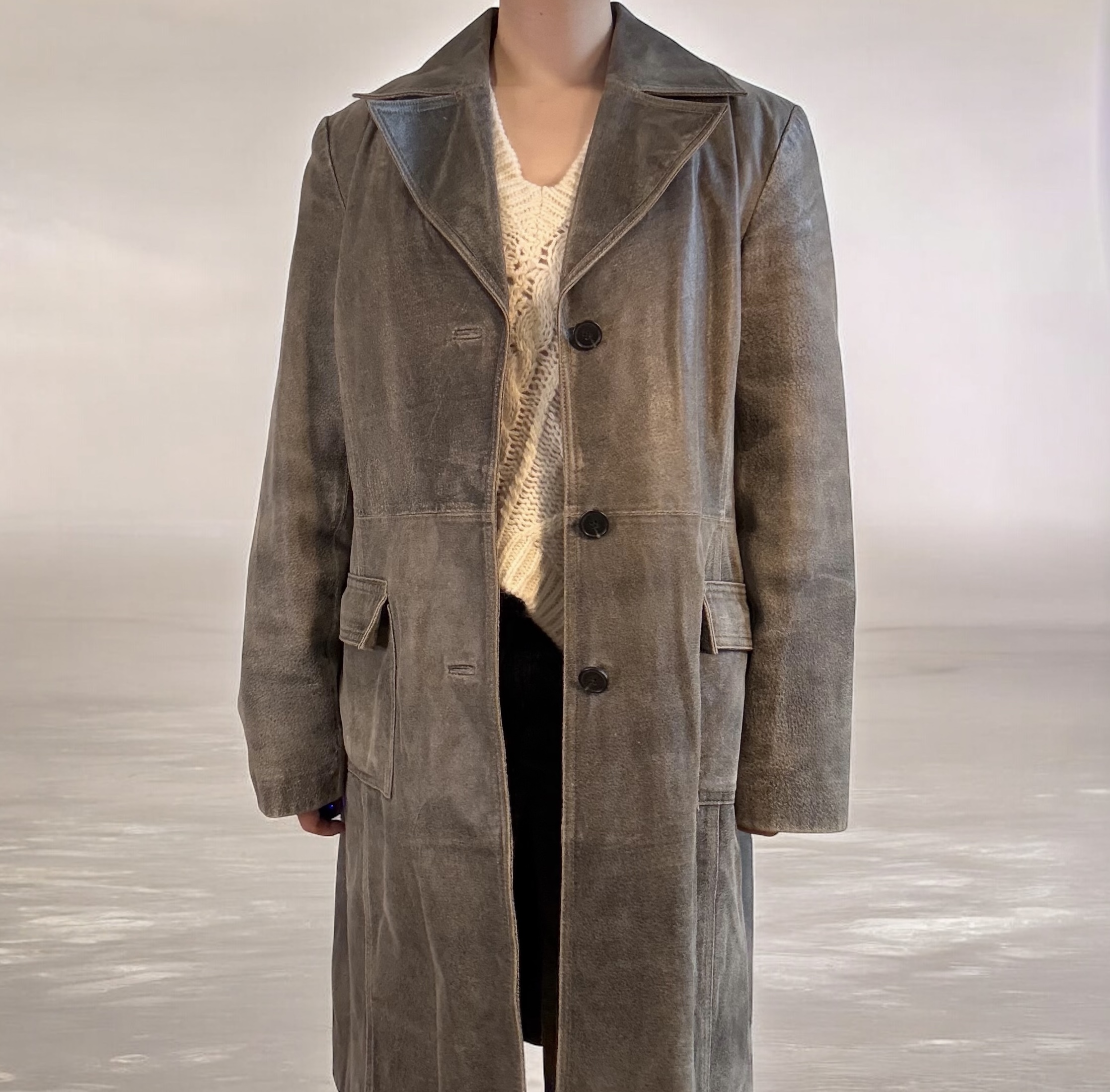 Distressed 100% leather trench coat.