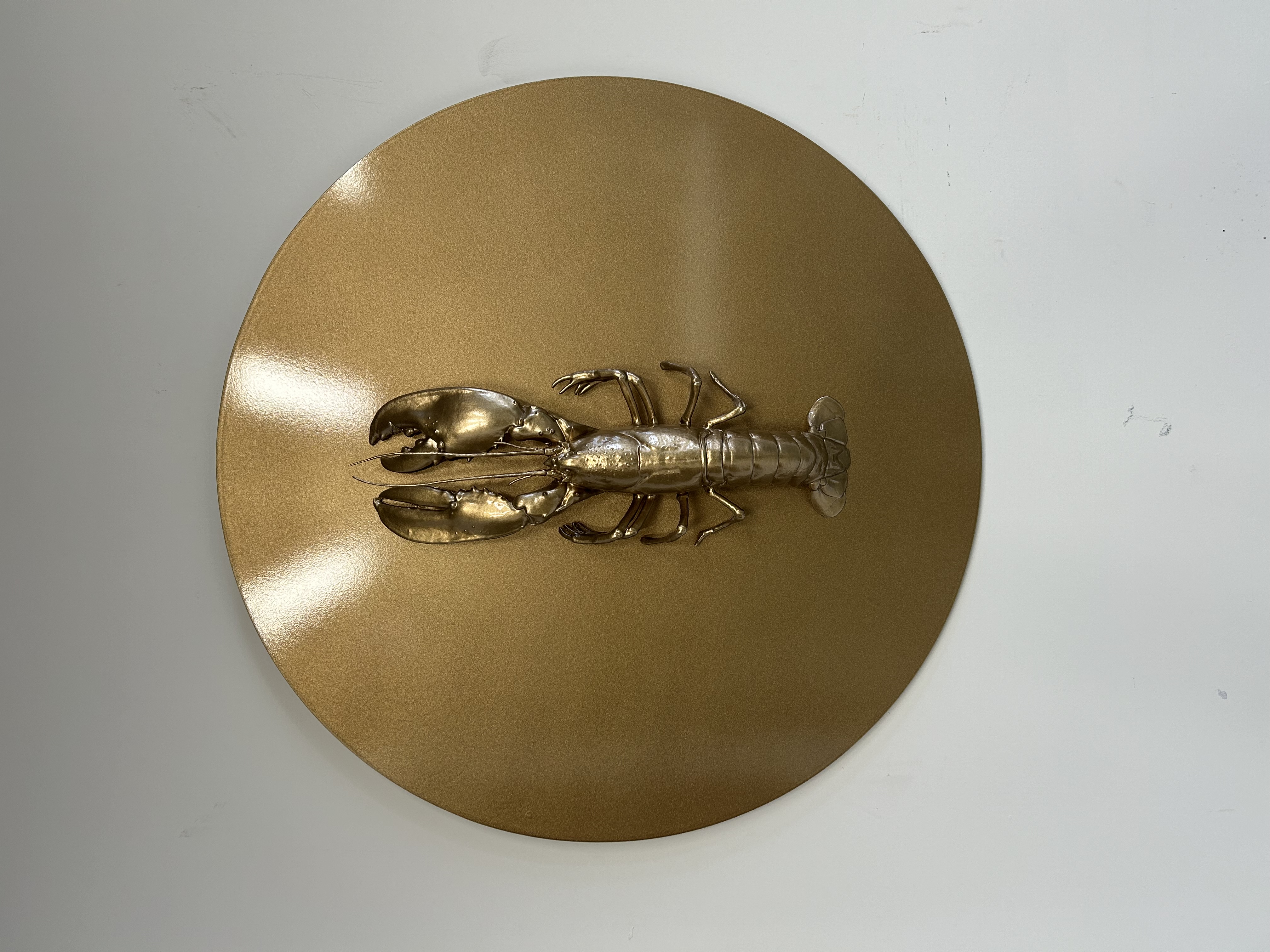 Gouden kreeft kunstwerk