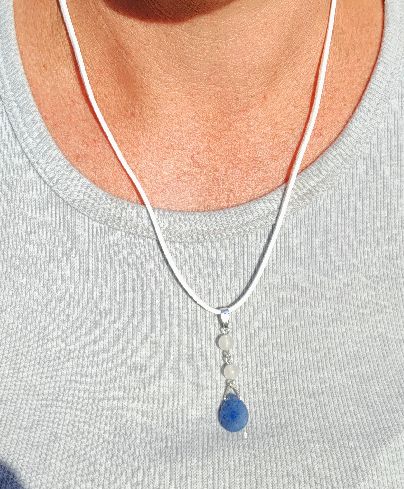 Elegant Gemstone Pendant on White Suede Cord Necklace