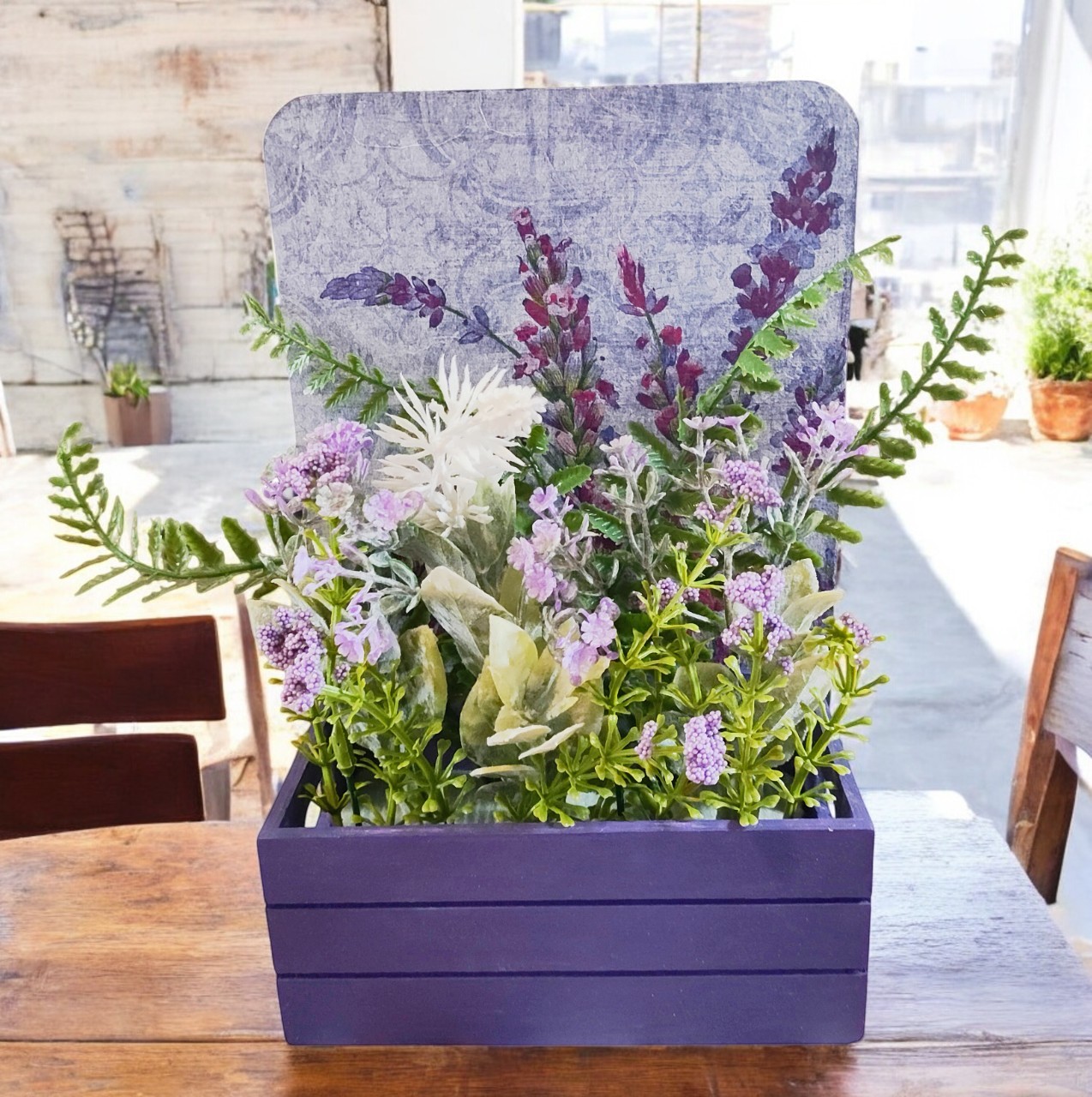 Artificial Flower Arrangement in Purple Wooden Decoupaged Planter 