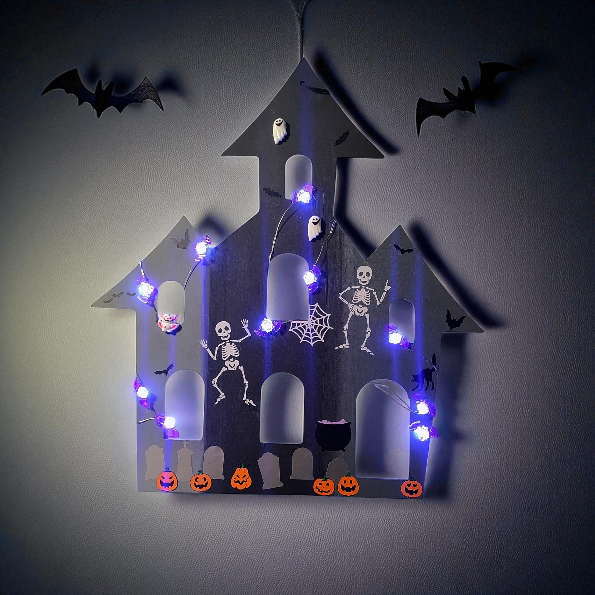 Lighted Haunted House Door Hanger