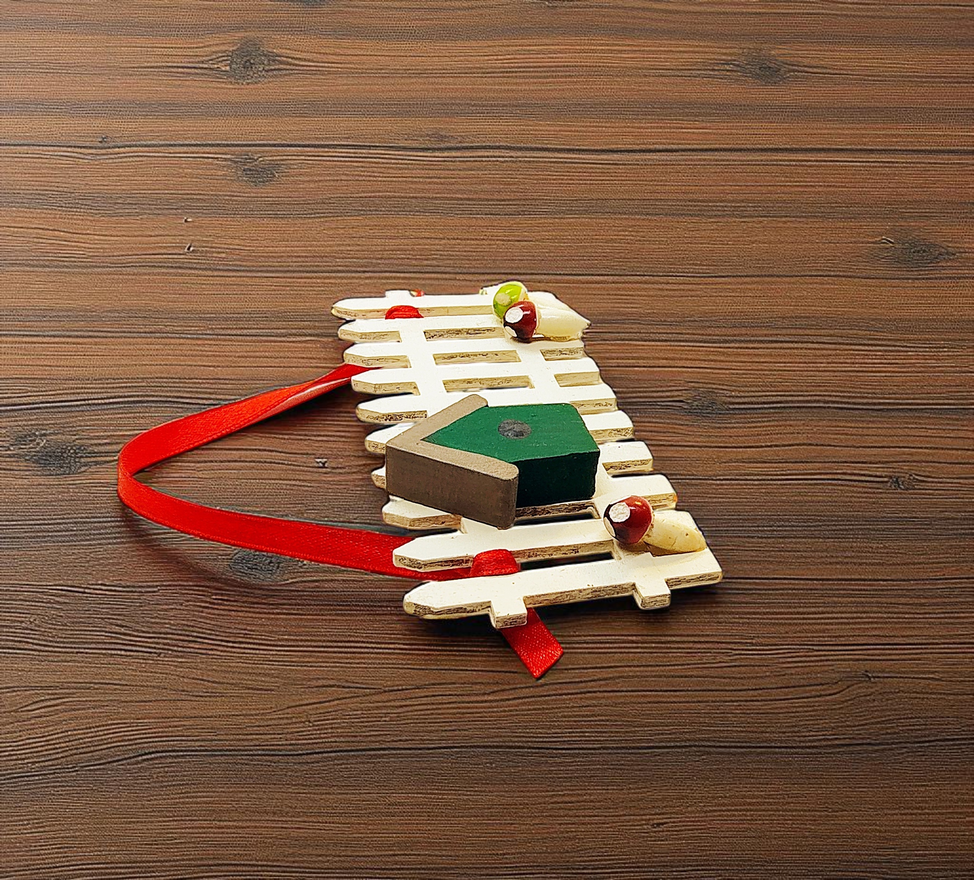 Wooden Picket Fence with Birdhouse Ornament