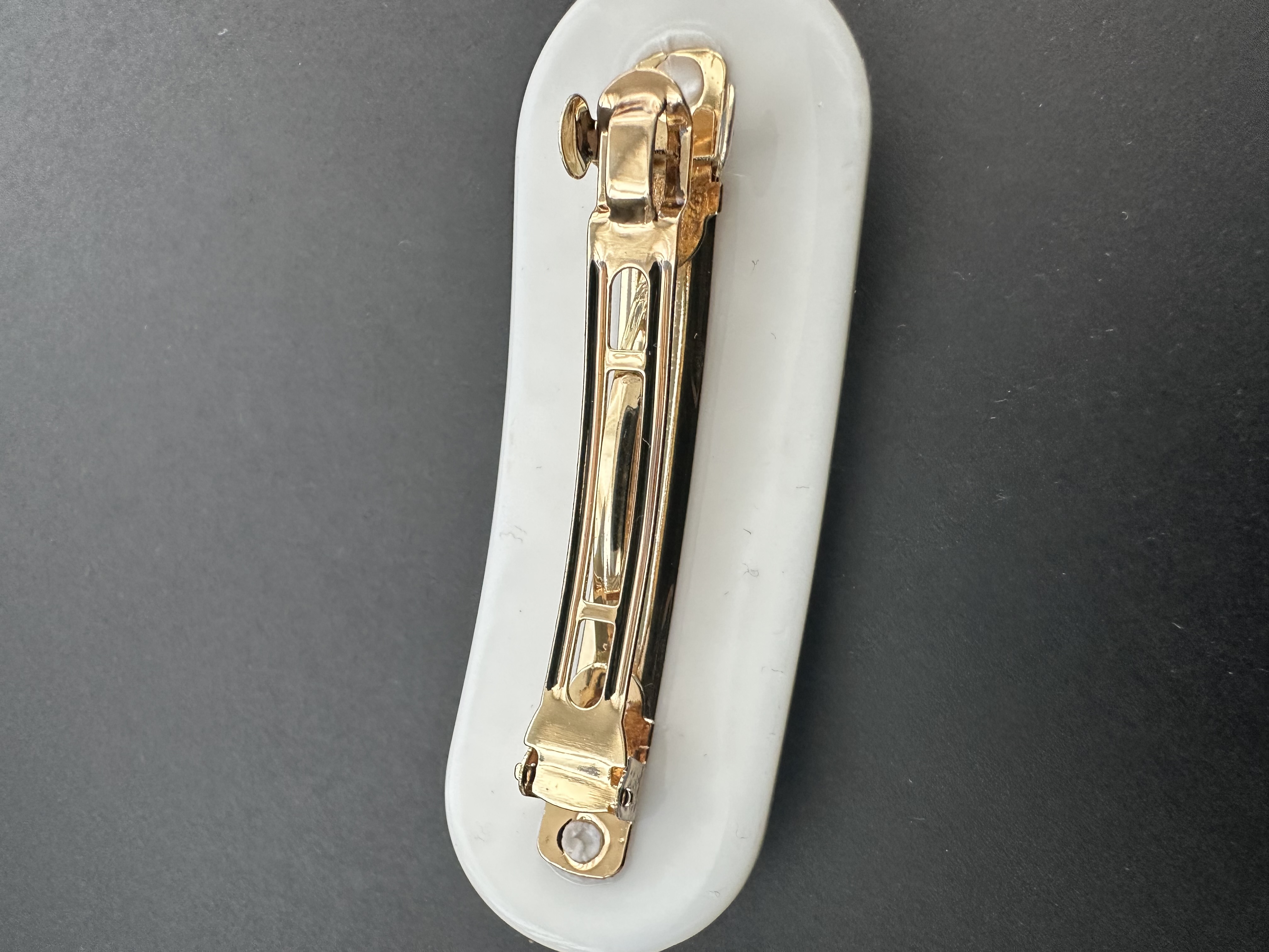 Gold metal hair barrette