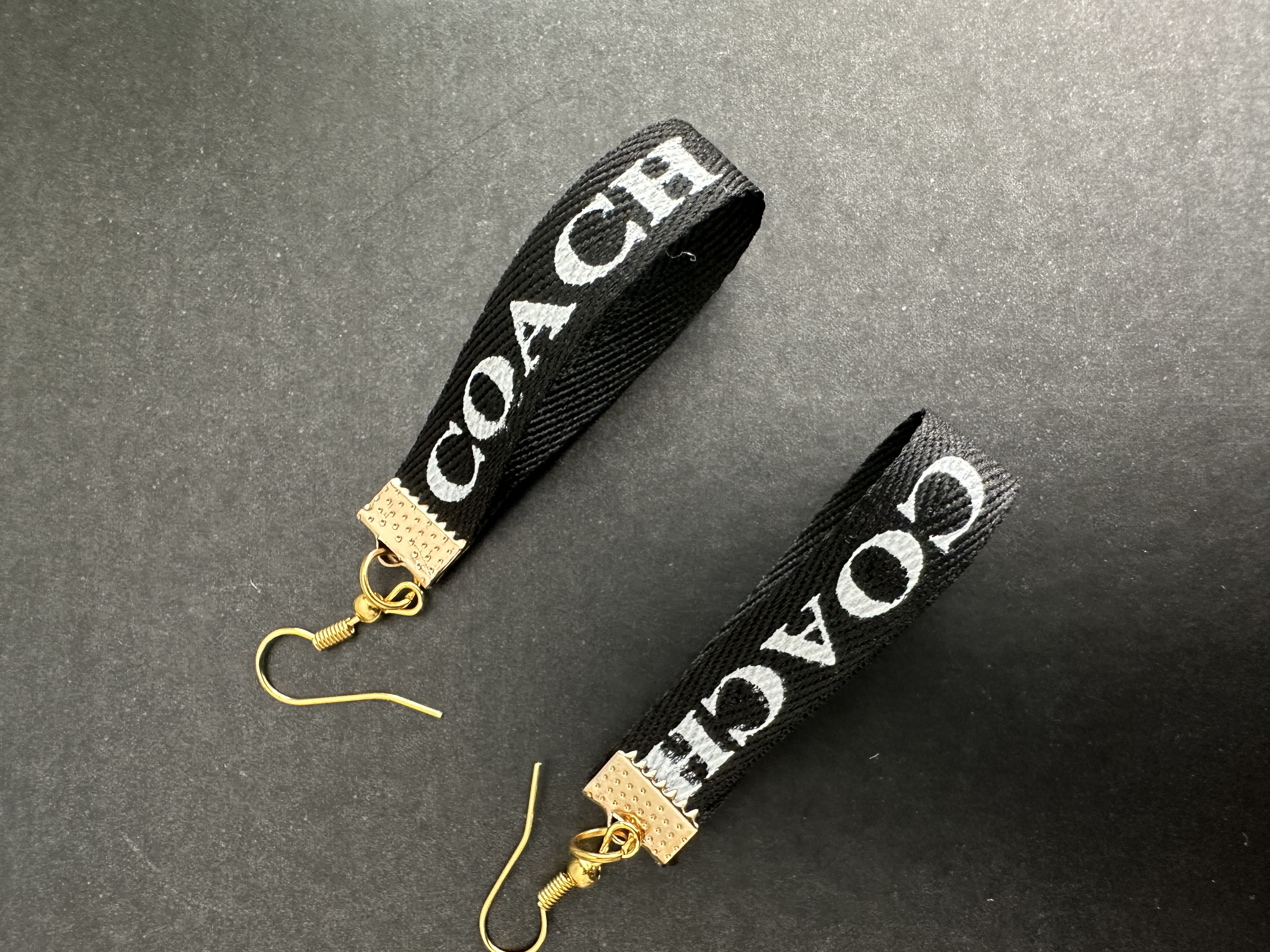 Coach branded earrings