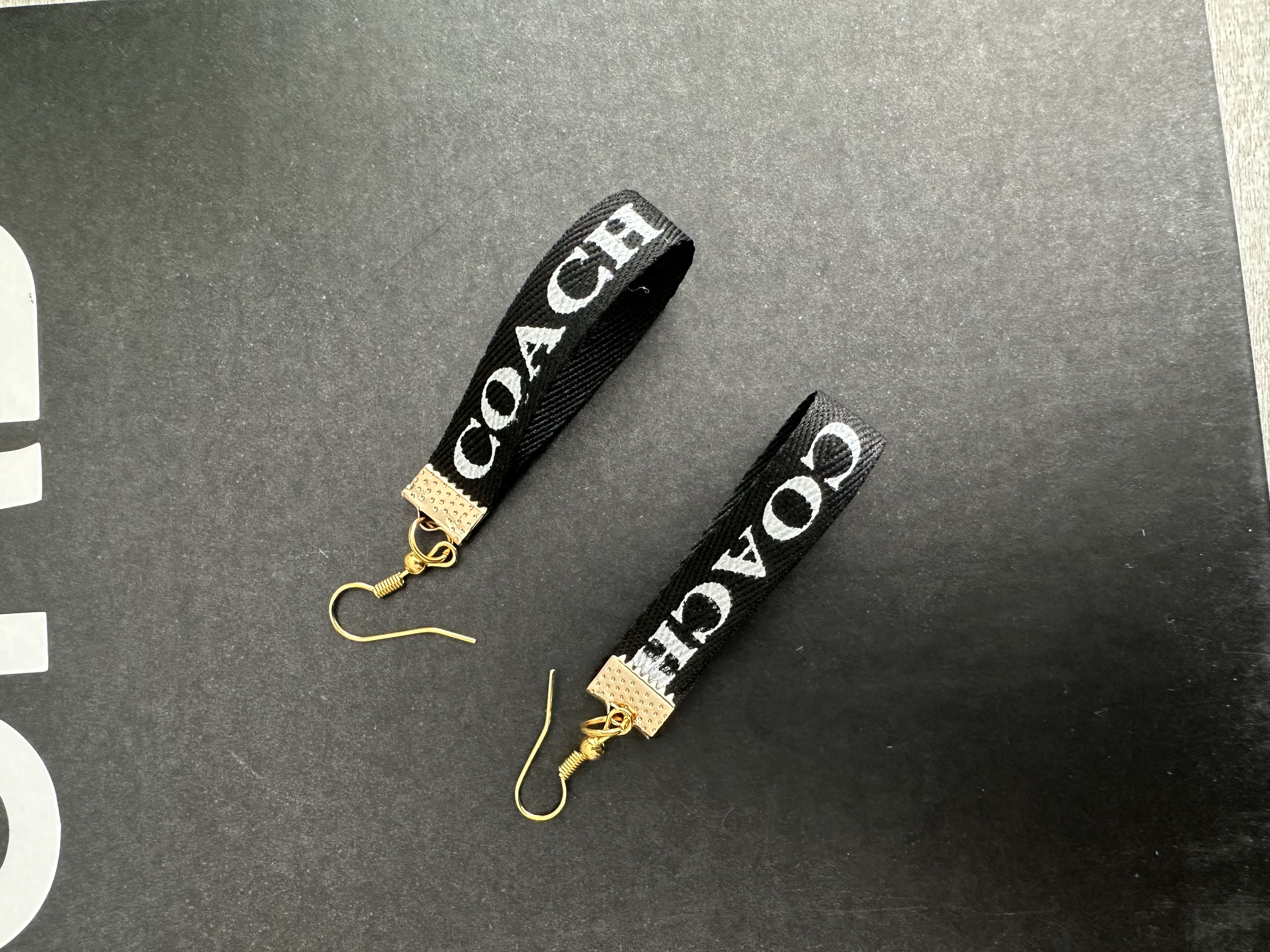 Coach branded earrings