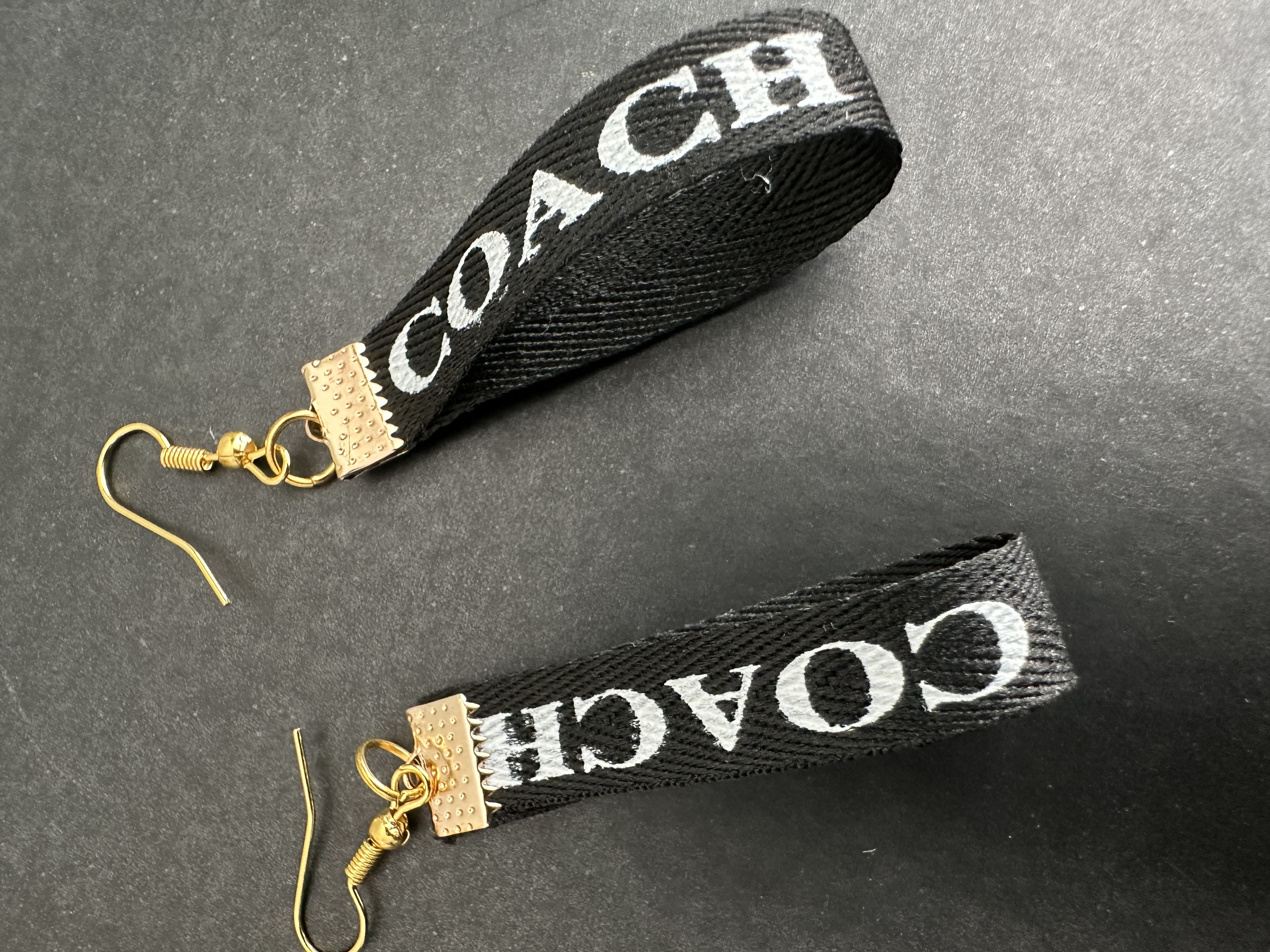 Coach branded earrings