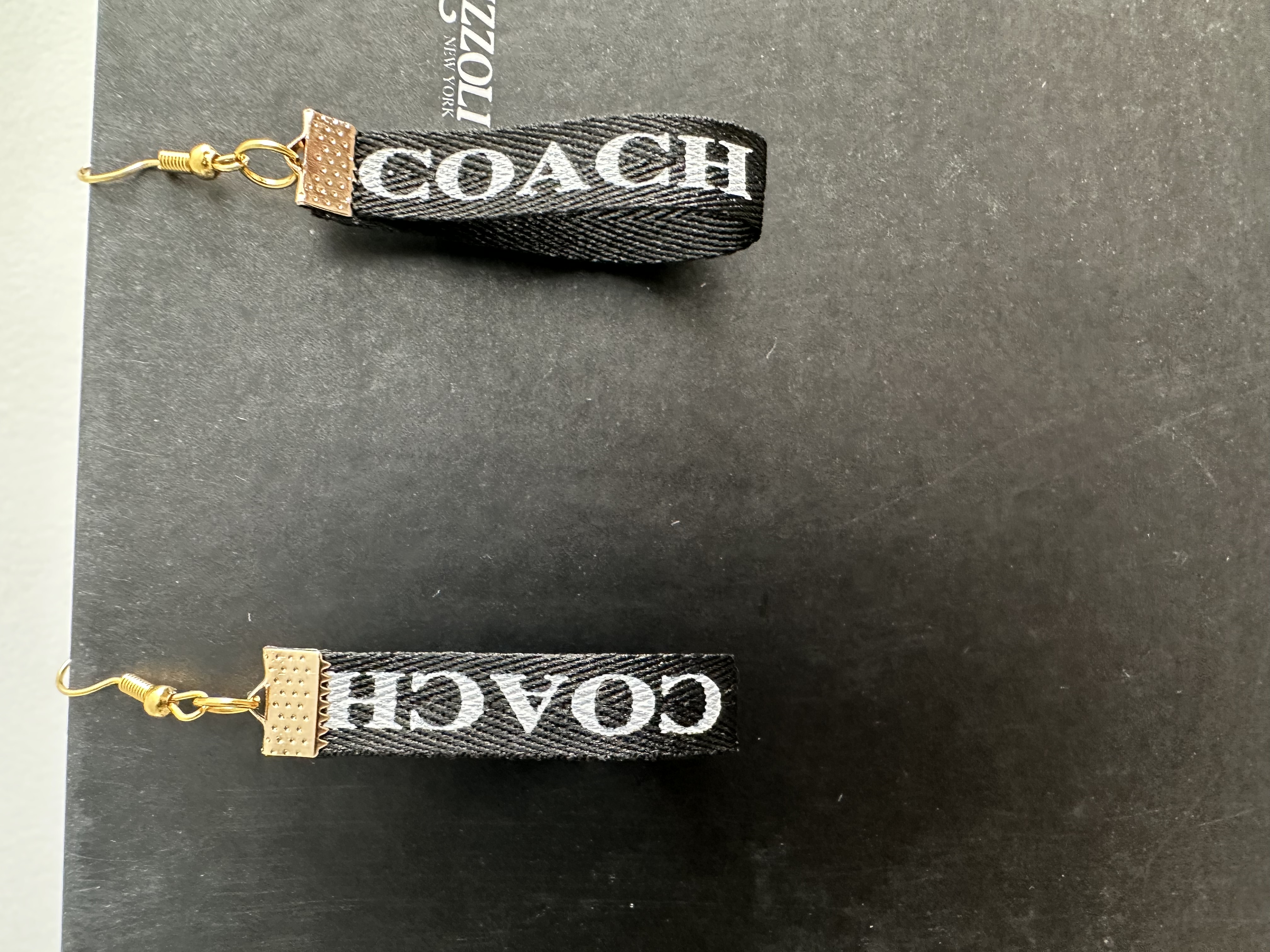 Coach branded earrings