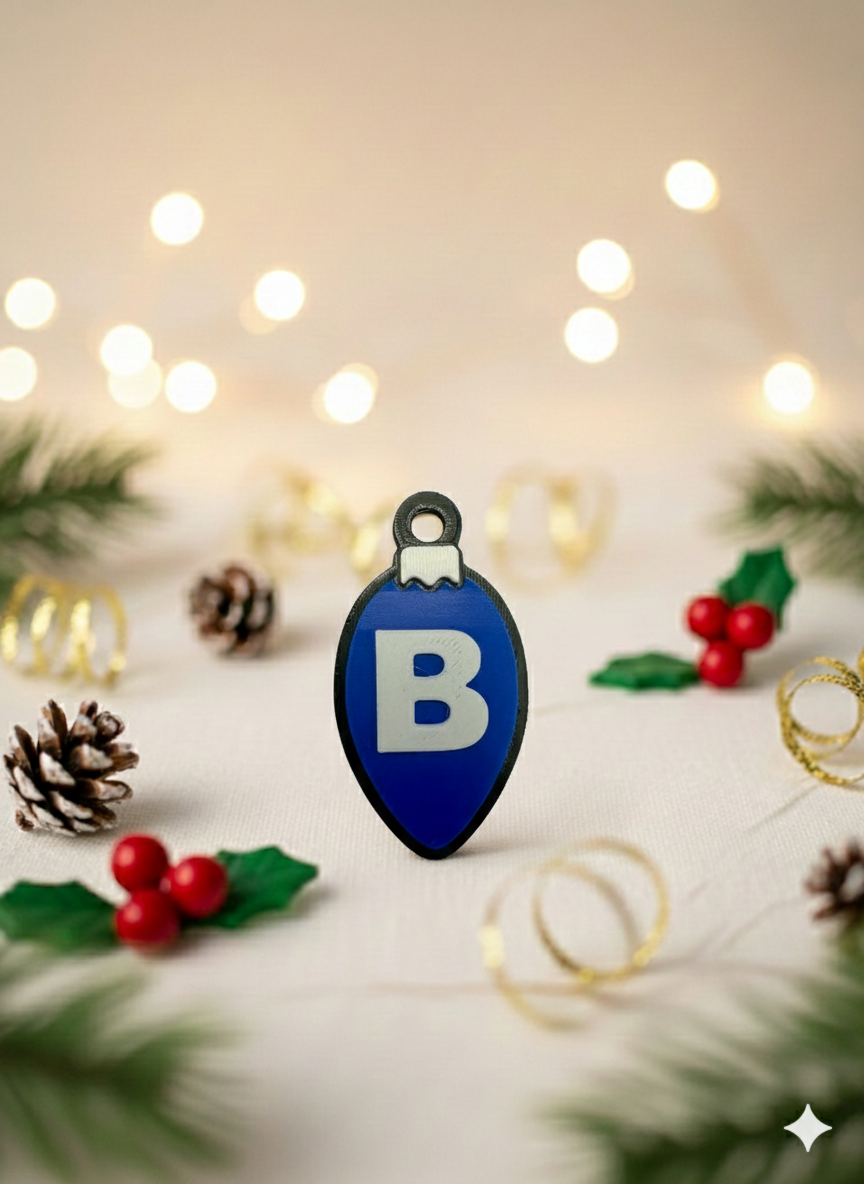 Classic tree bulb shape with one embossed letter (A-Z) per ornament.