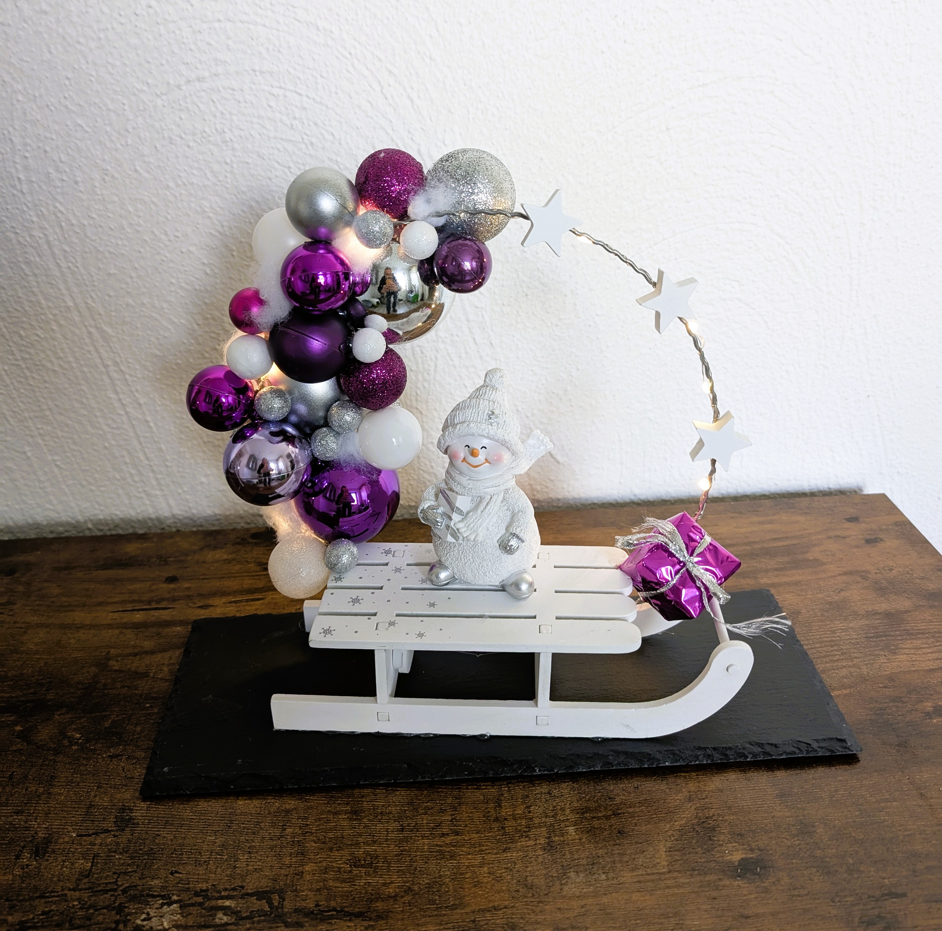 Beleuchteter Loop auf einer Schieferplatte