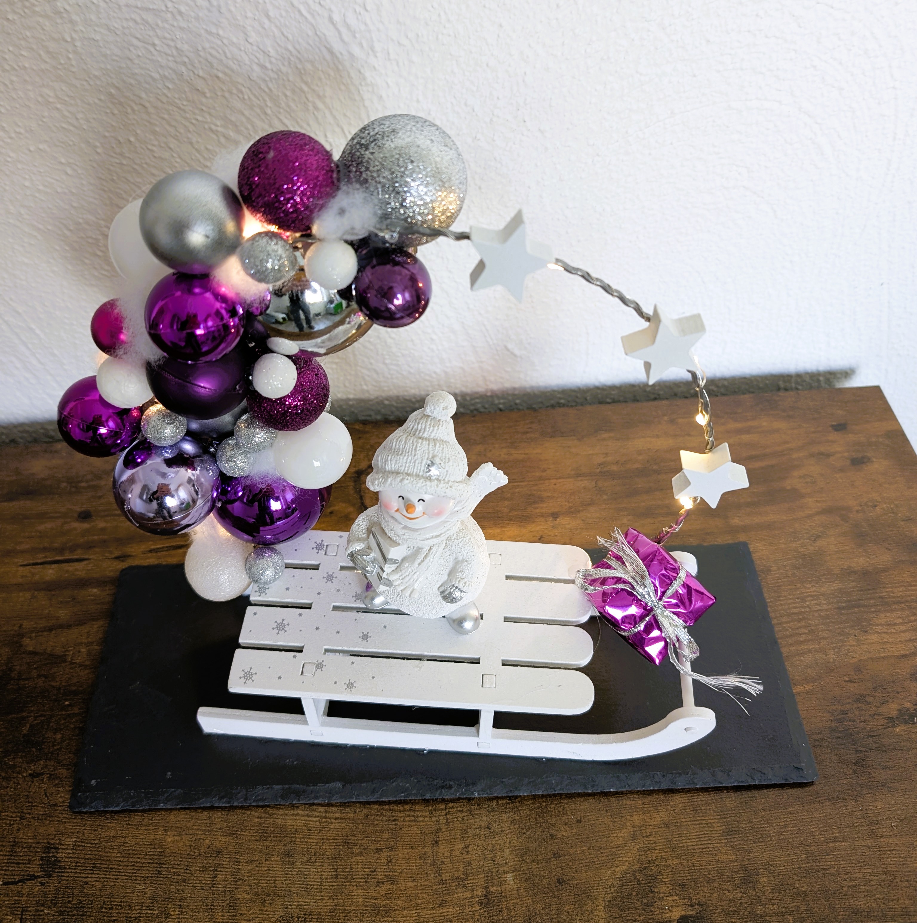 Beleuchteter Loop auf einer Schieferplatte