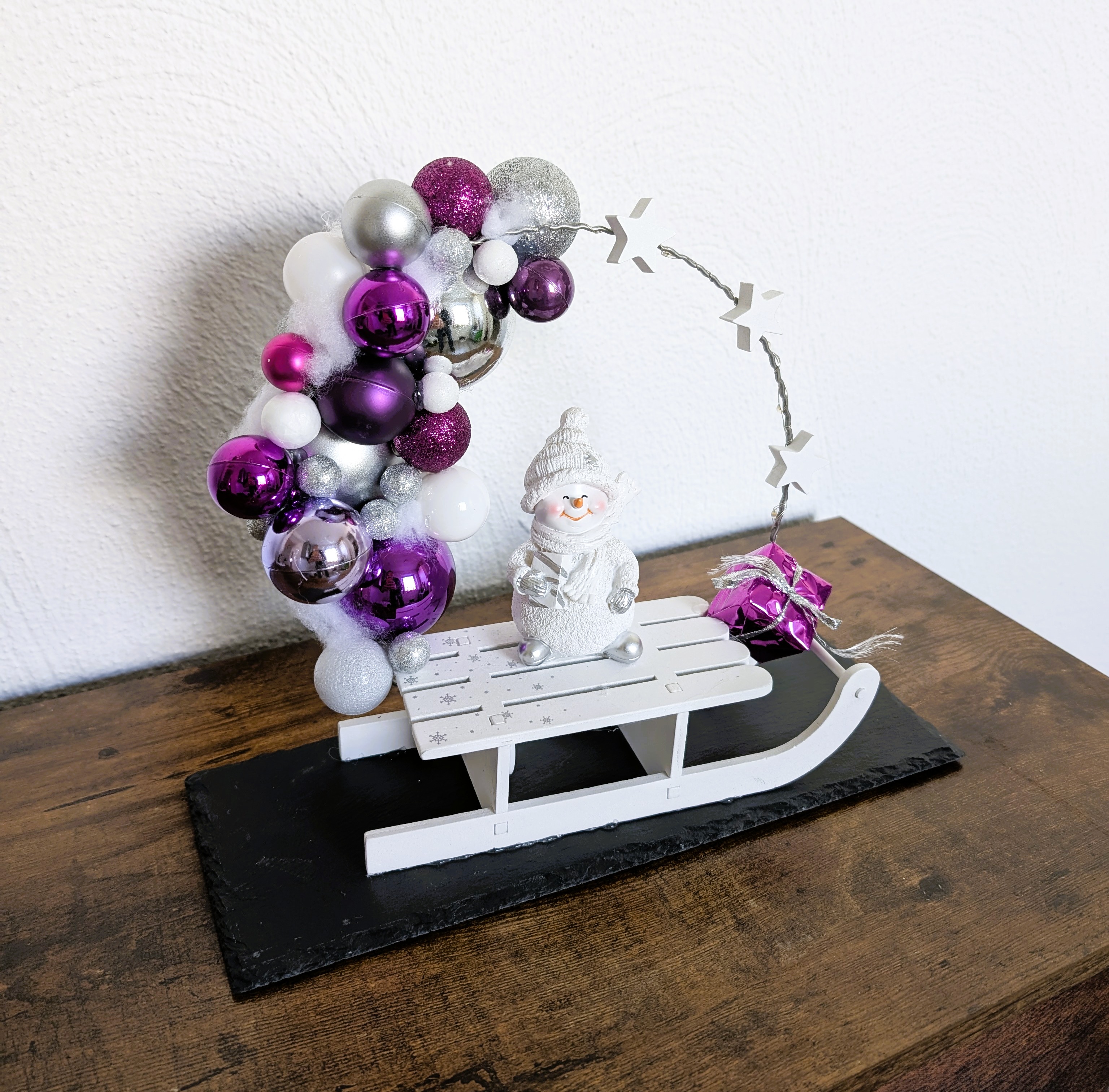 Beleuchteter Loop auf einer Schieferplatte