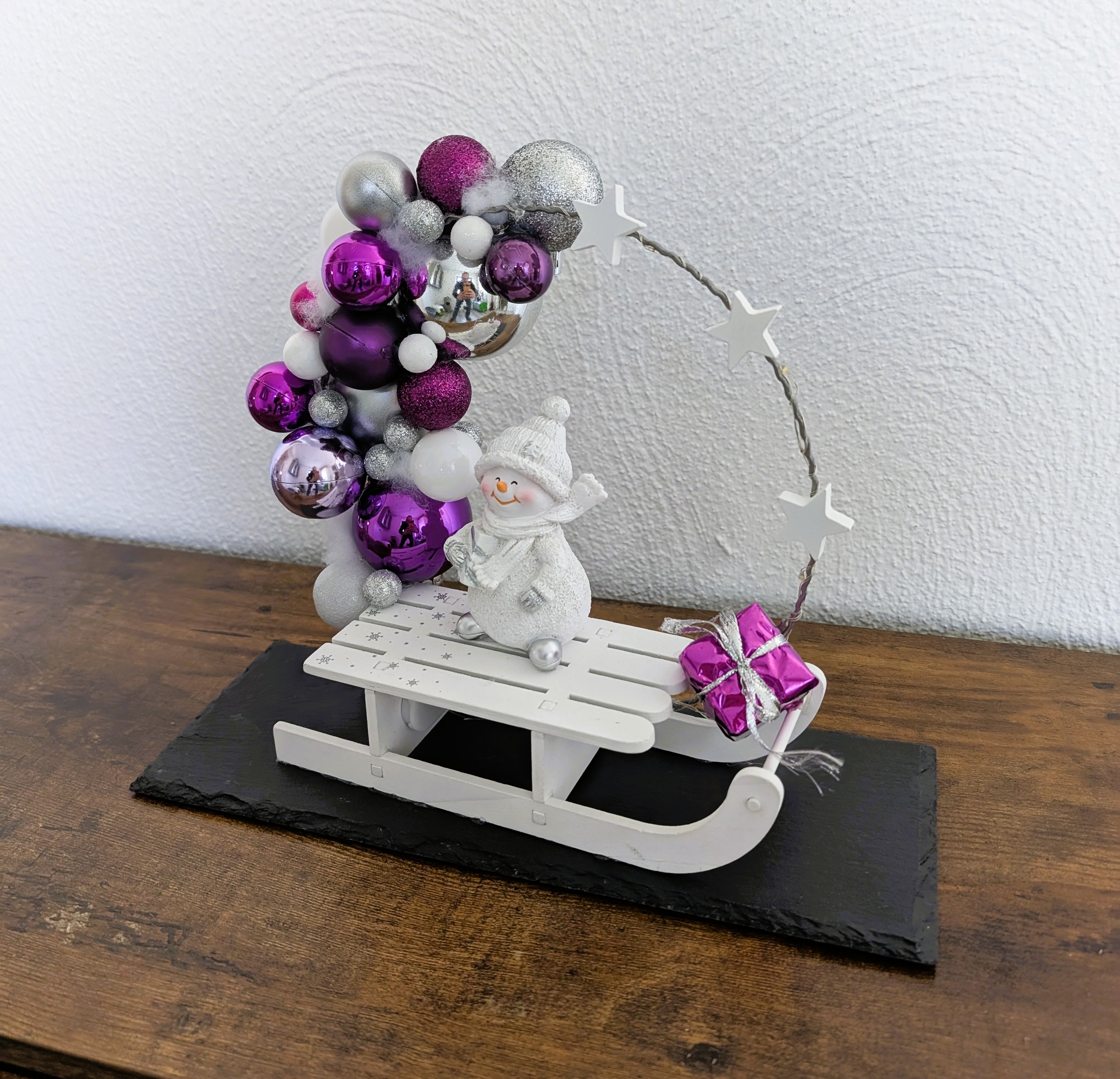 Beleuchteter Loop auf einer Schieferplatte