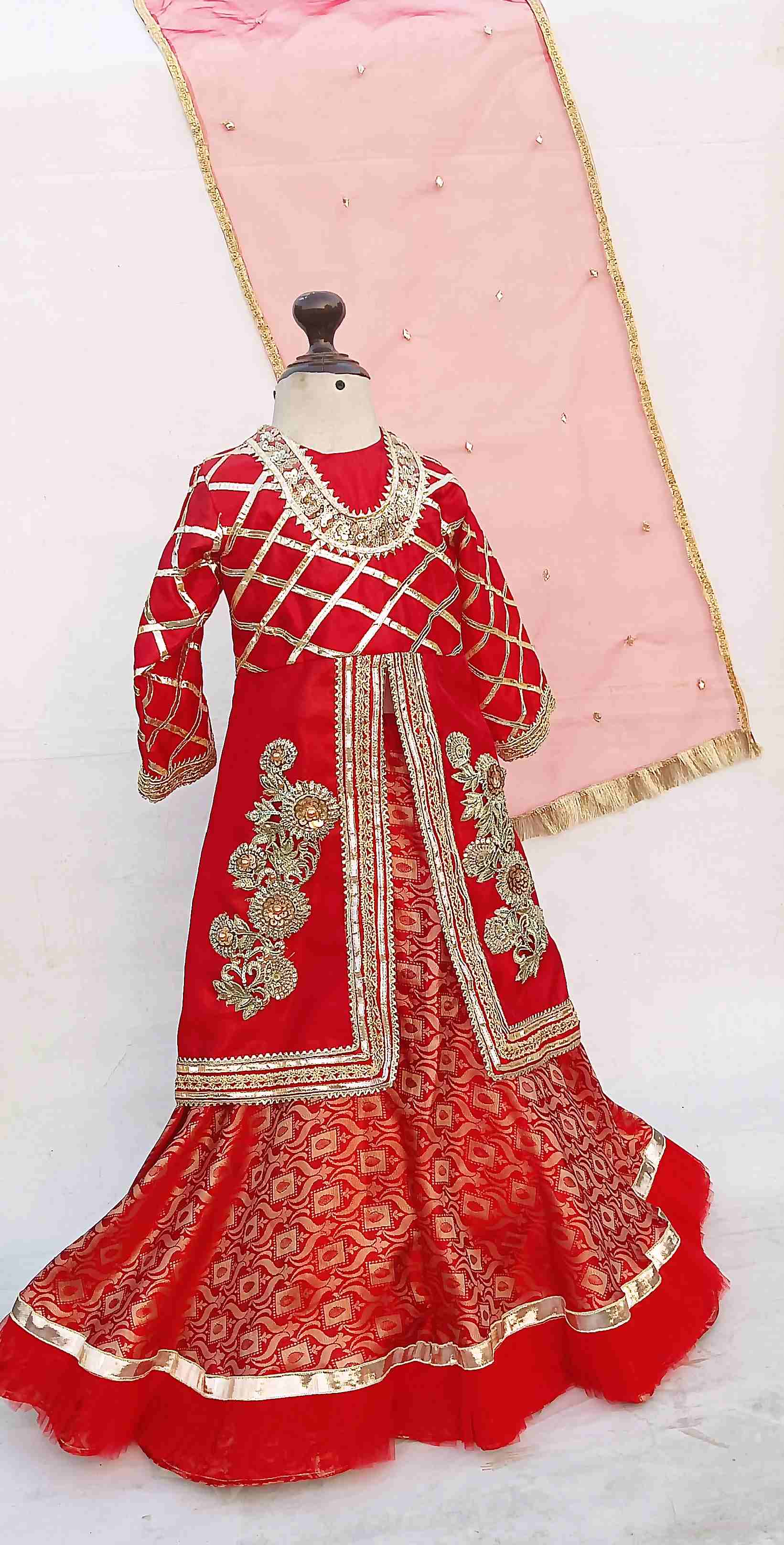 wedding zest lehnga and angrakha top, with hand embelisment of gotta kinari work accentuated with appliqe