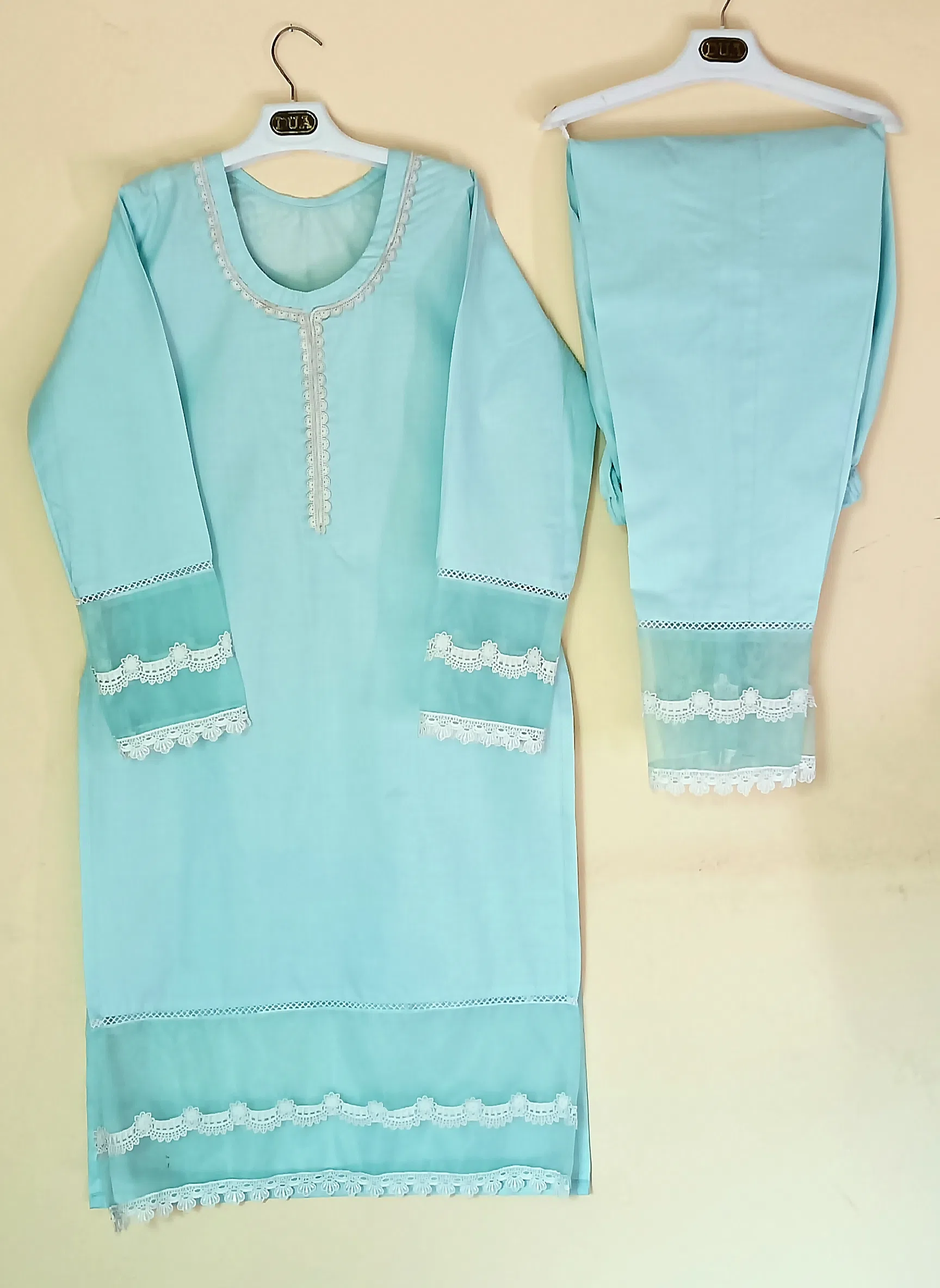 serenity Discover serene elegance with our Lace Breeze shalwar qameez. Delicate shatel lace graces the neckline, while net-backed sleeves and hem offer a modern twist. Perfect for adding a touch of refined style to any occasion.