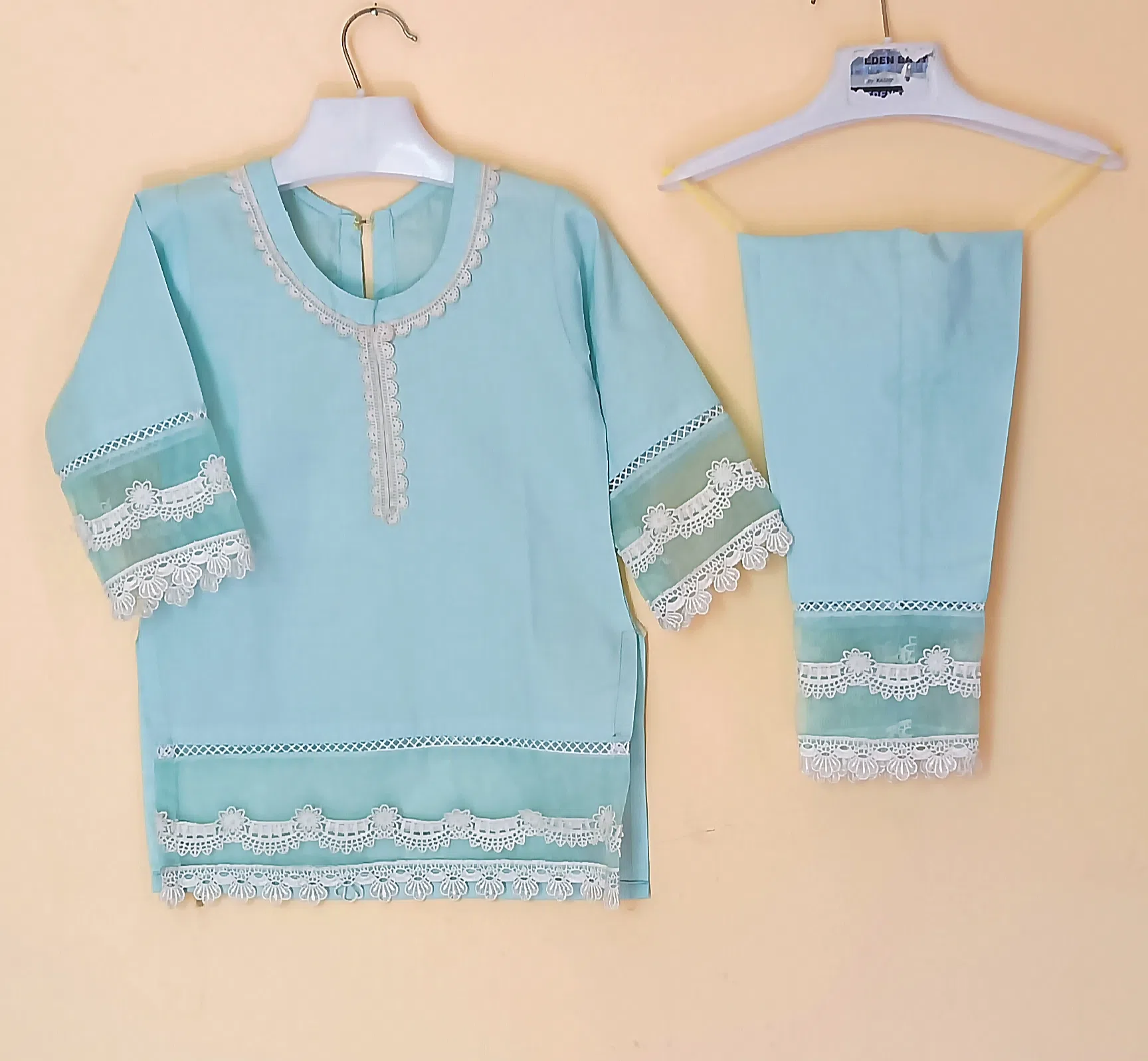 serenity Discover serene elegance with our Lace Breeze shalwar qameez. Delicate shatel lace graces the neckline, while net-backed sleeves and hem offer a modern twist. Perfect for adding a touch of refined style to any occasion.