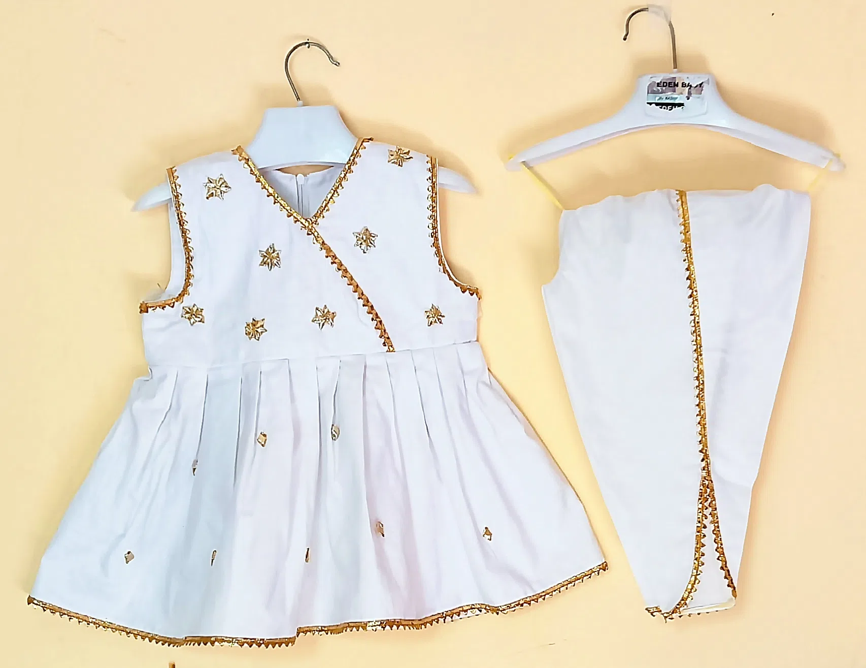 Gotta Grace Outfit Embrace timeless style with this exquisite ensemble. Intricate gotta work adorns the frock, creating a captivating interplay of light and texture.