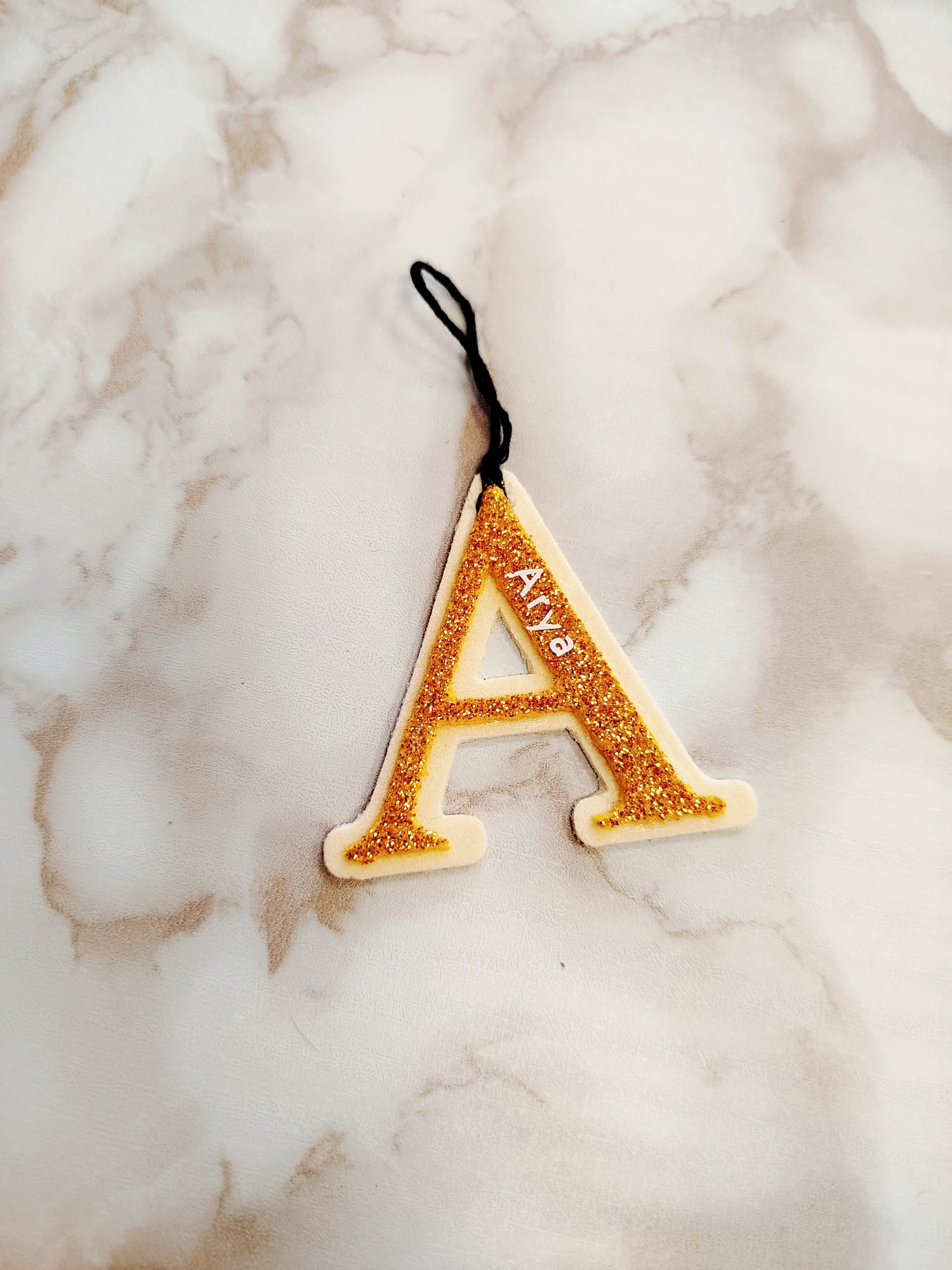 Letra colgante glitter