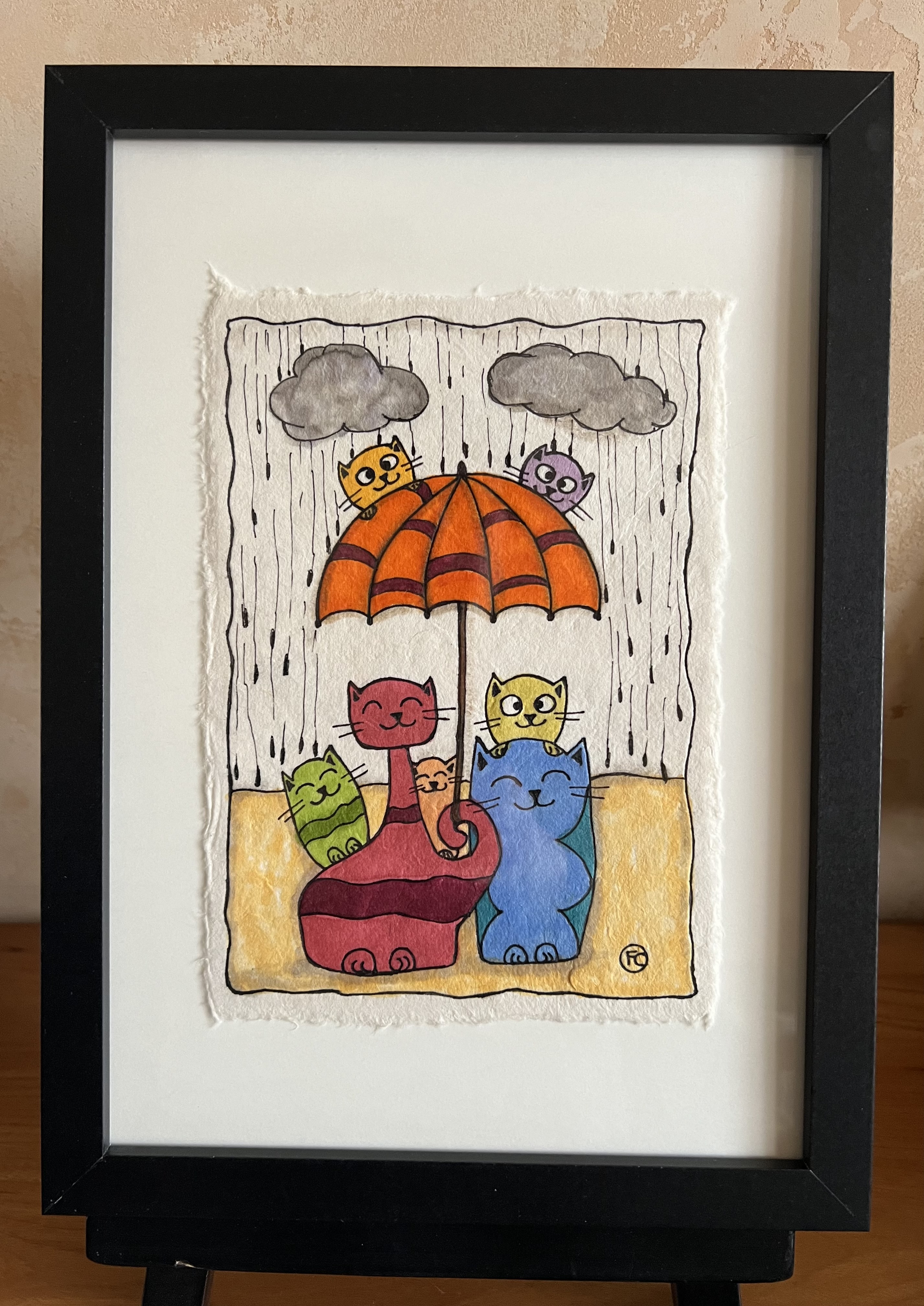 Chatons sous la pluie