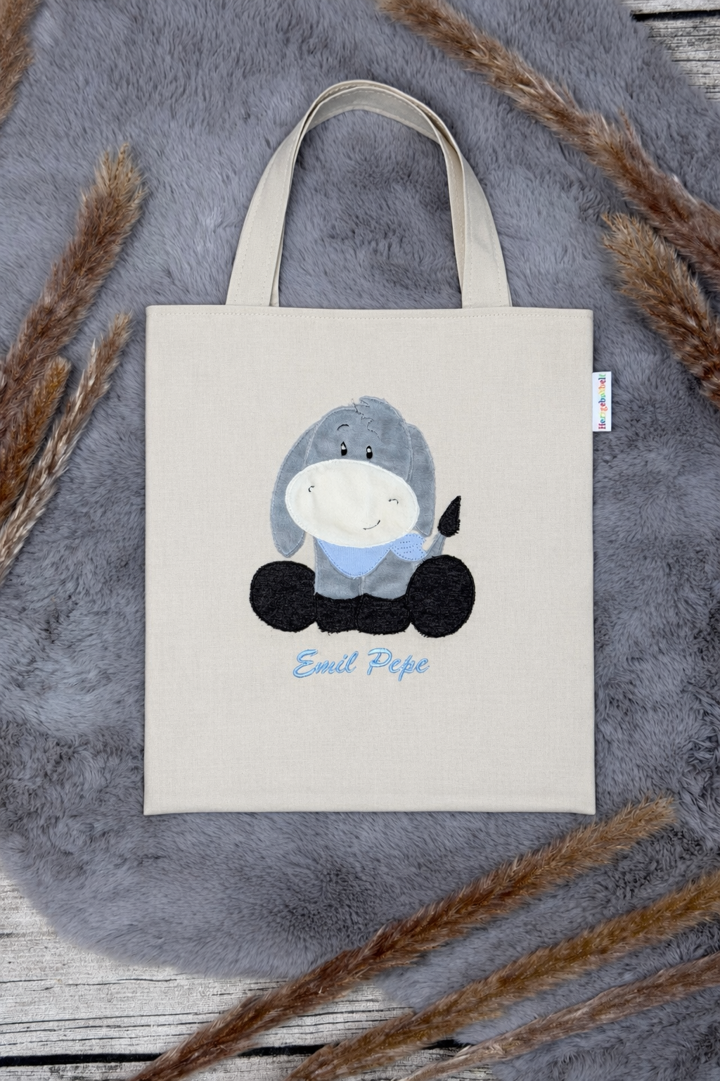 Baumwollbeutel mit Stickmotiv und Klettverschluss