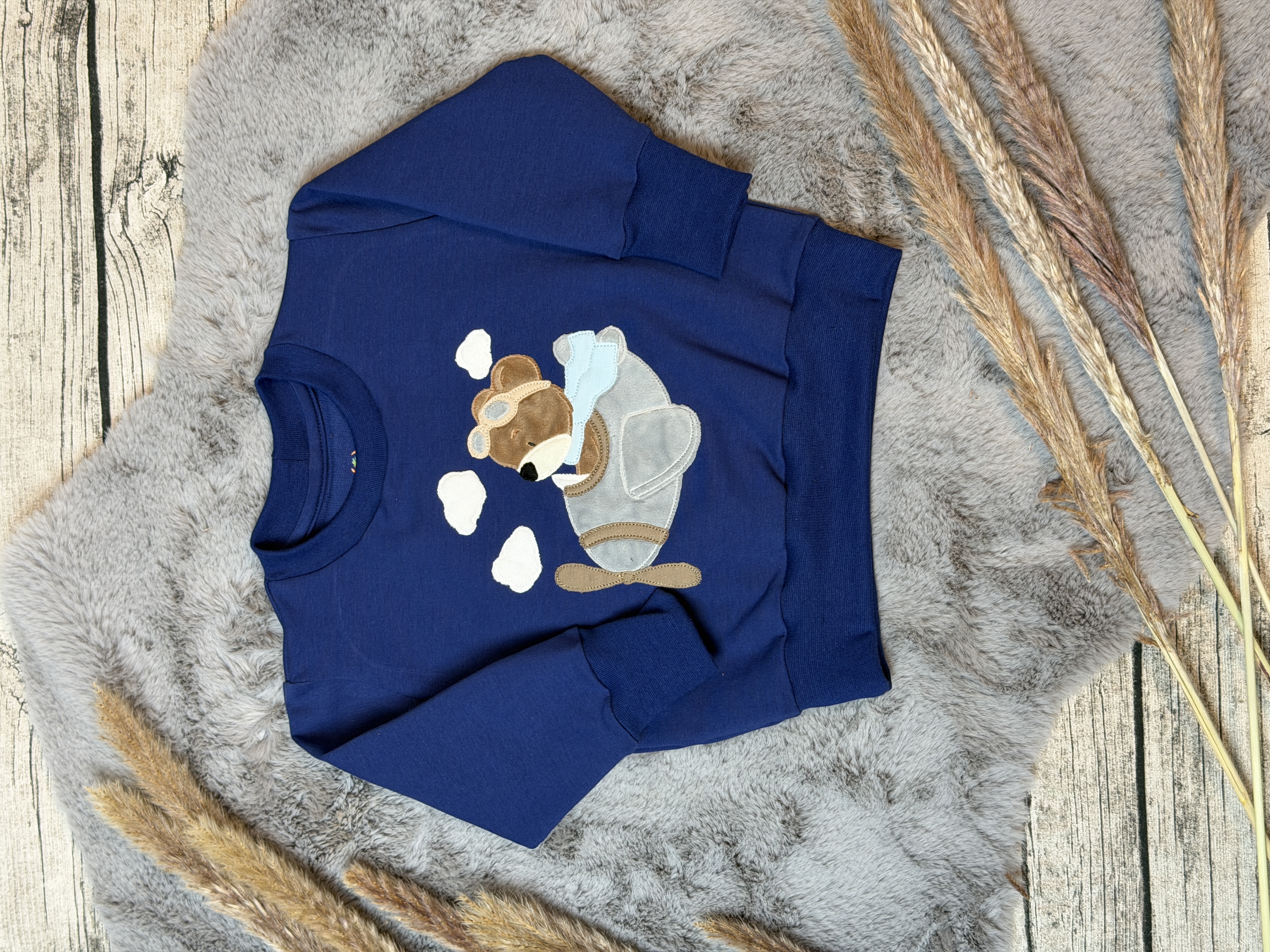 Oversize Sweater mit Stickmotiv Piloten Teddy