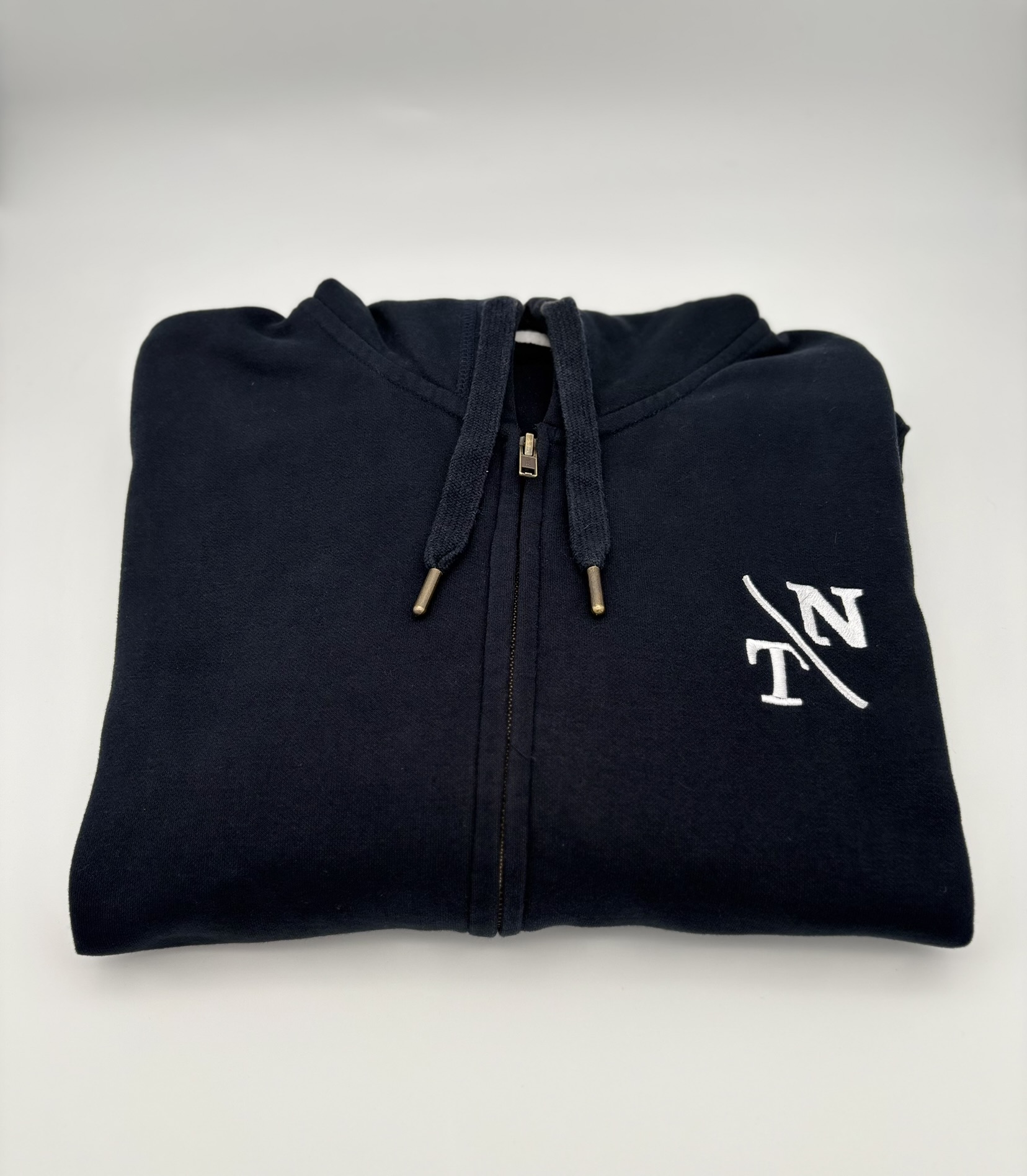 Pull à zipette logo Tenat