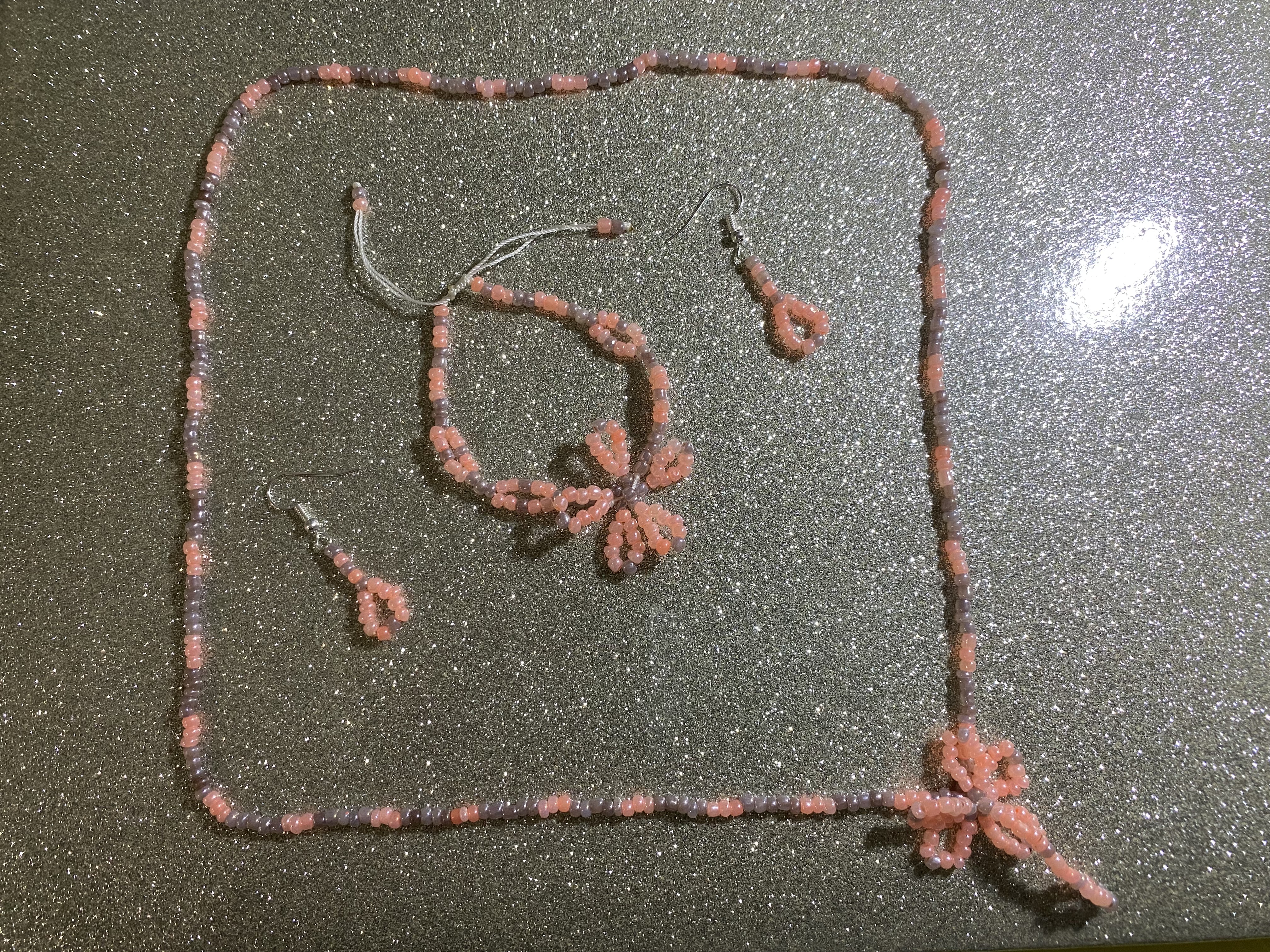 Parure fleurie corail & marron